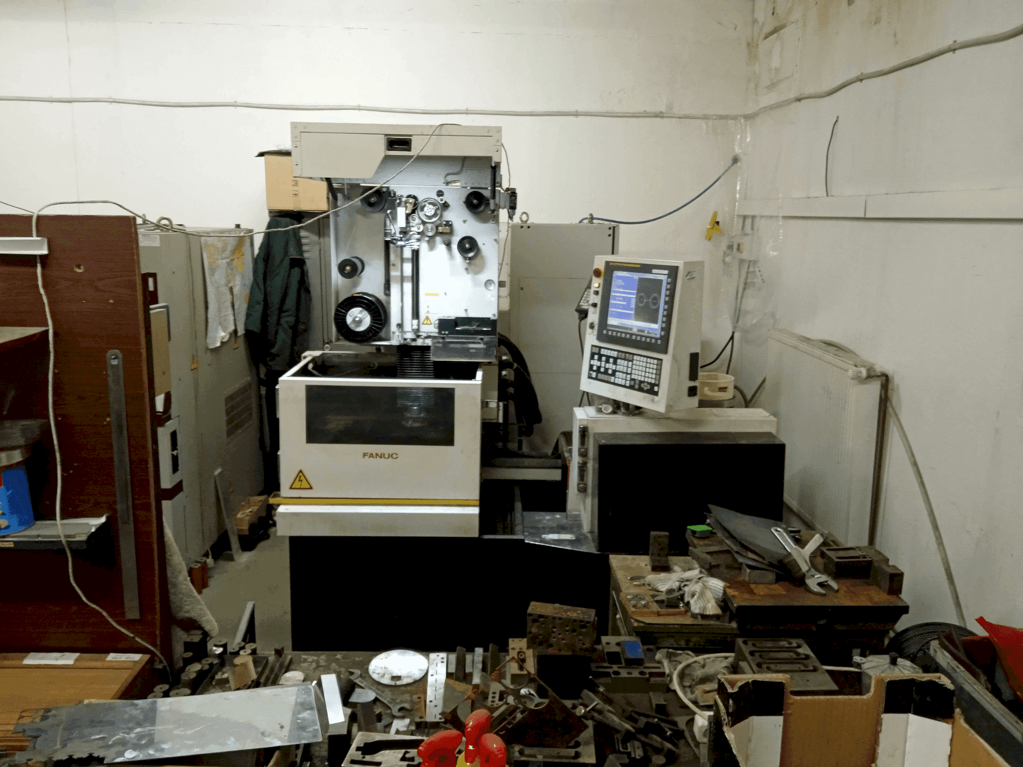 Mašīnas FANUC Robocut Alpha 0iE pretskats