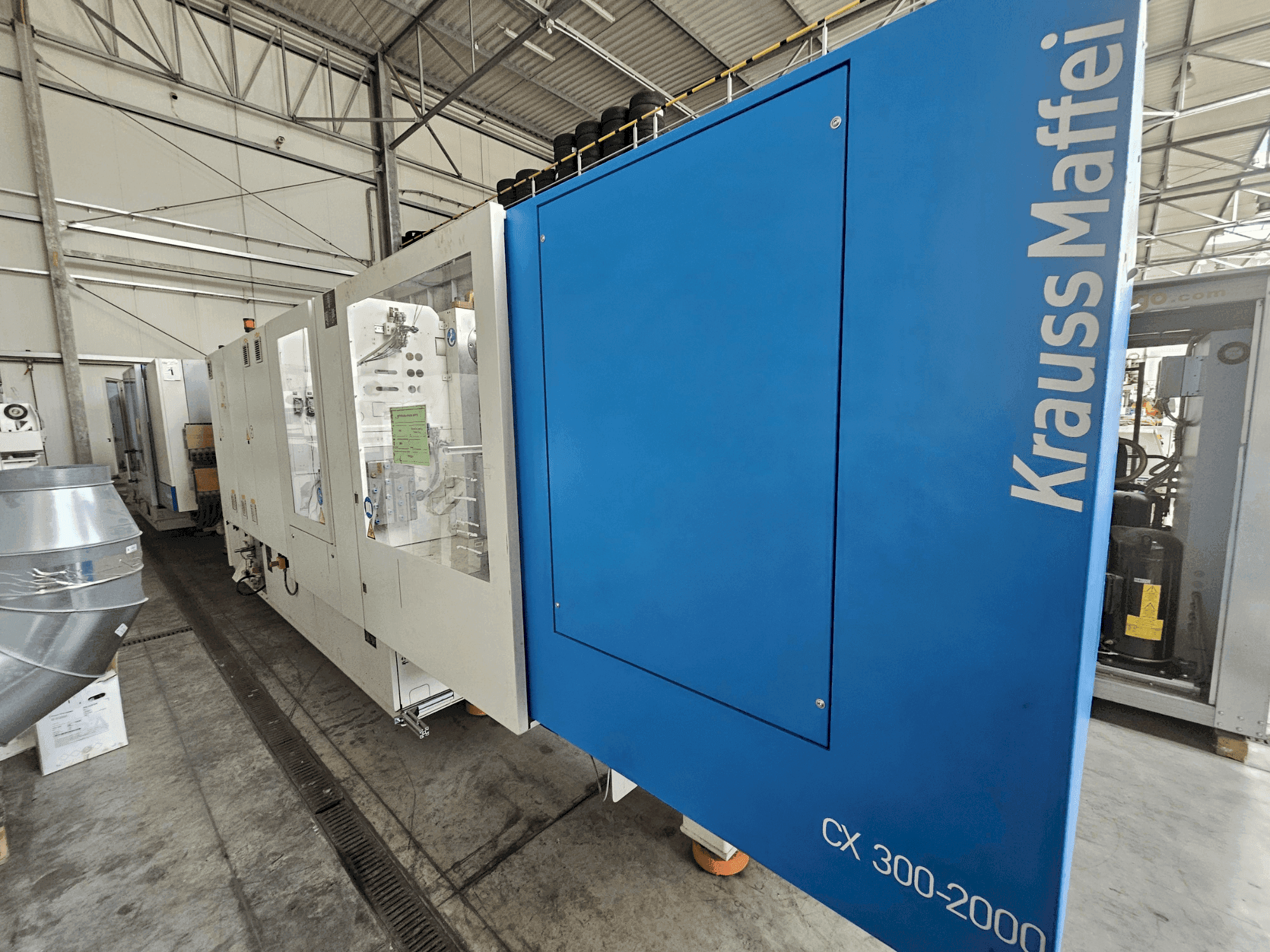 Mašīnas Krauss Maffei 300-2000 CX pretskats