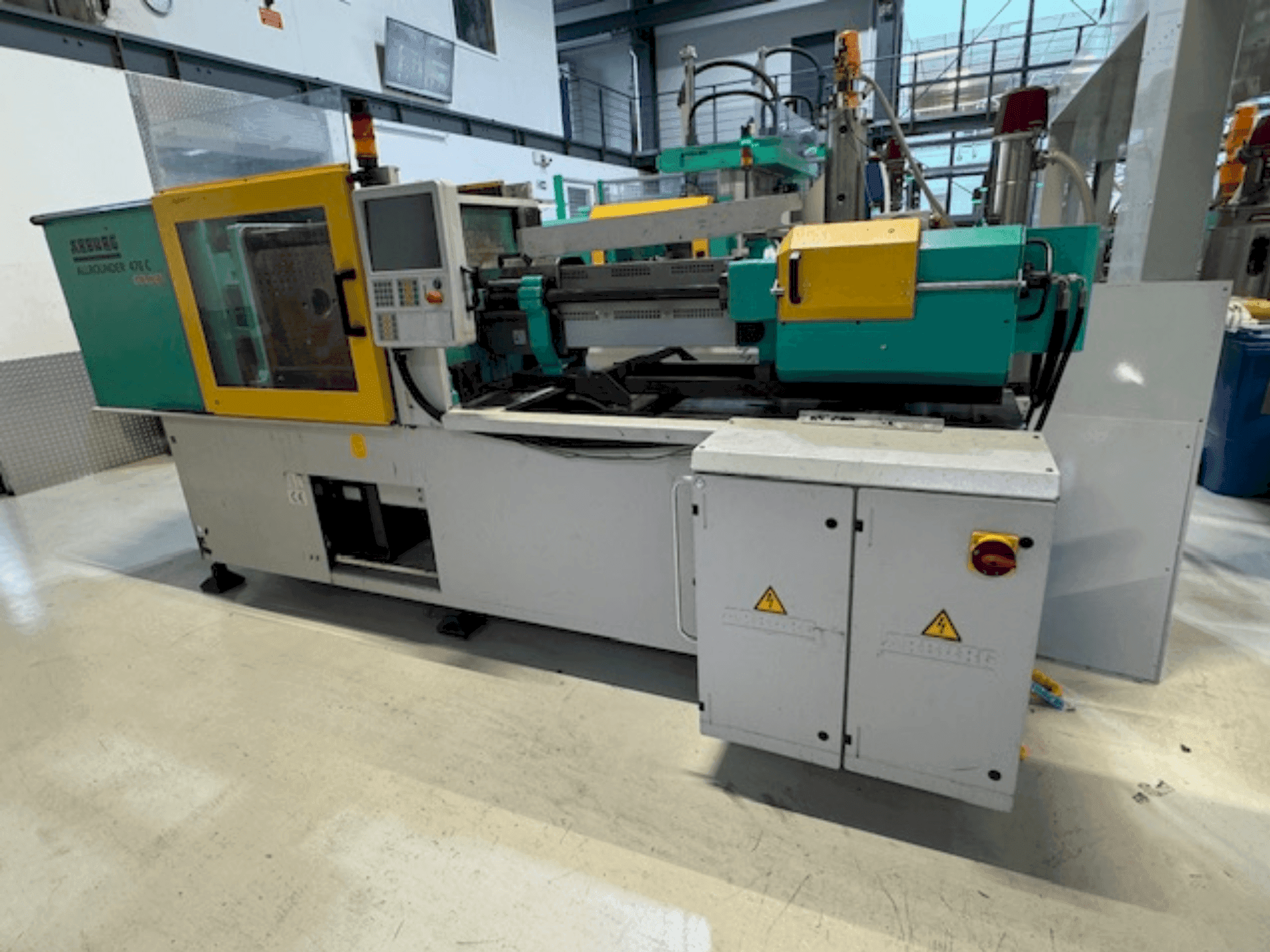 Mašīnas Arburg A470 C 1500-400 pretskats