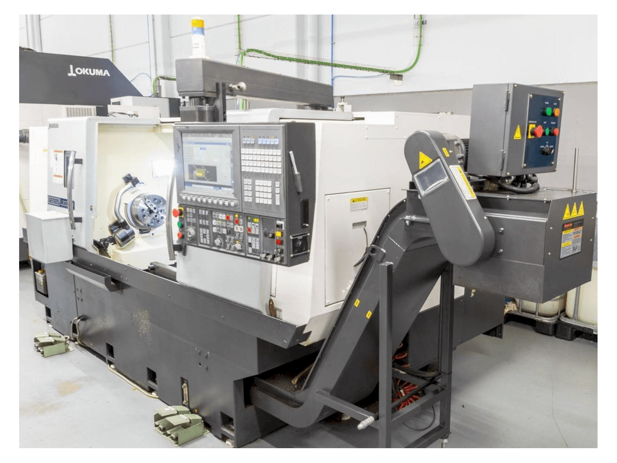 Mašīnas Okuma Genos L300E-M pretskats