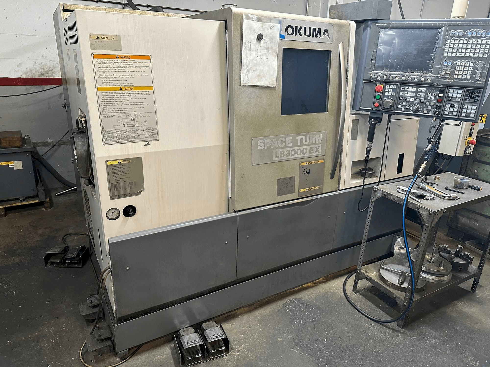 Mašīnas Okuma LB 3000EX pretskats