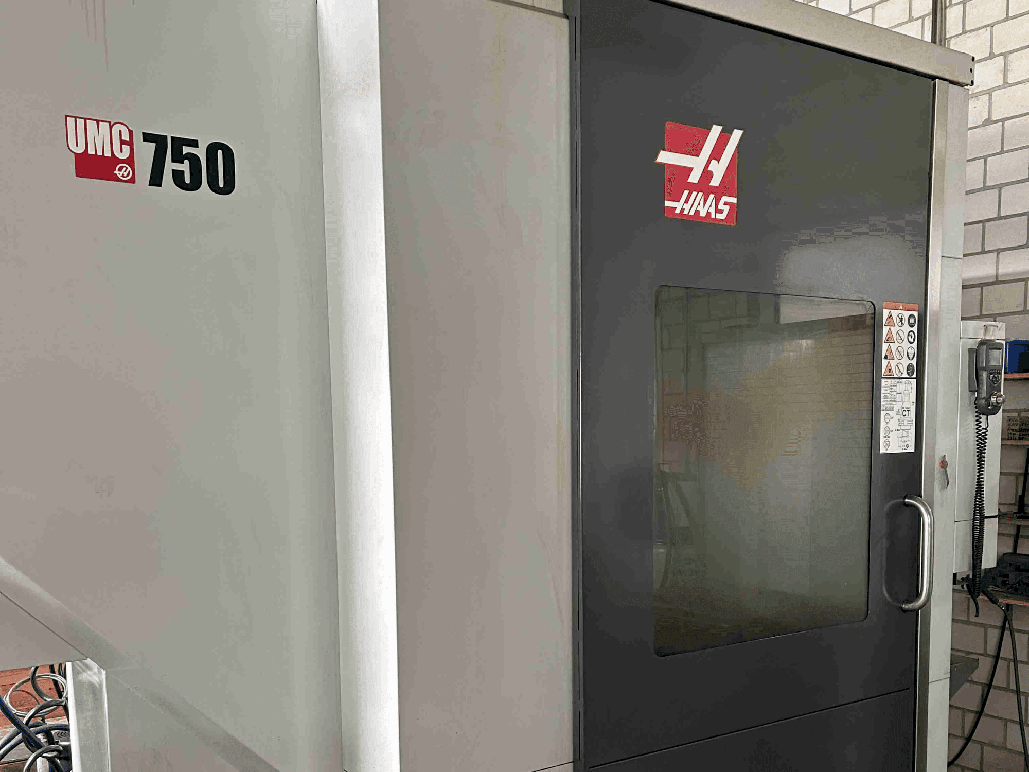 Mašīnas HAAS UMC-750 pretskats