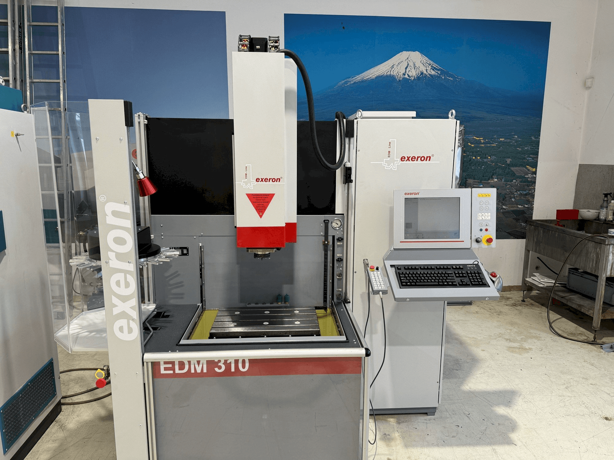 Mašīnas Exeron EDM 310 MF 20 pretskats