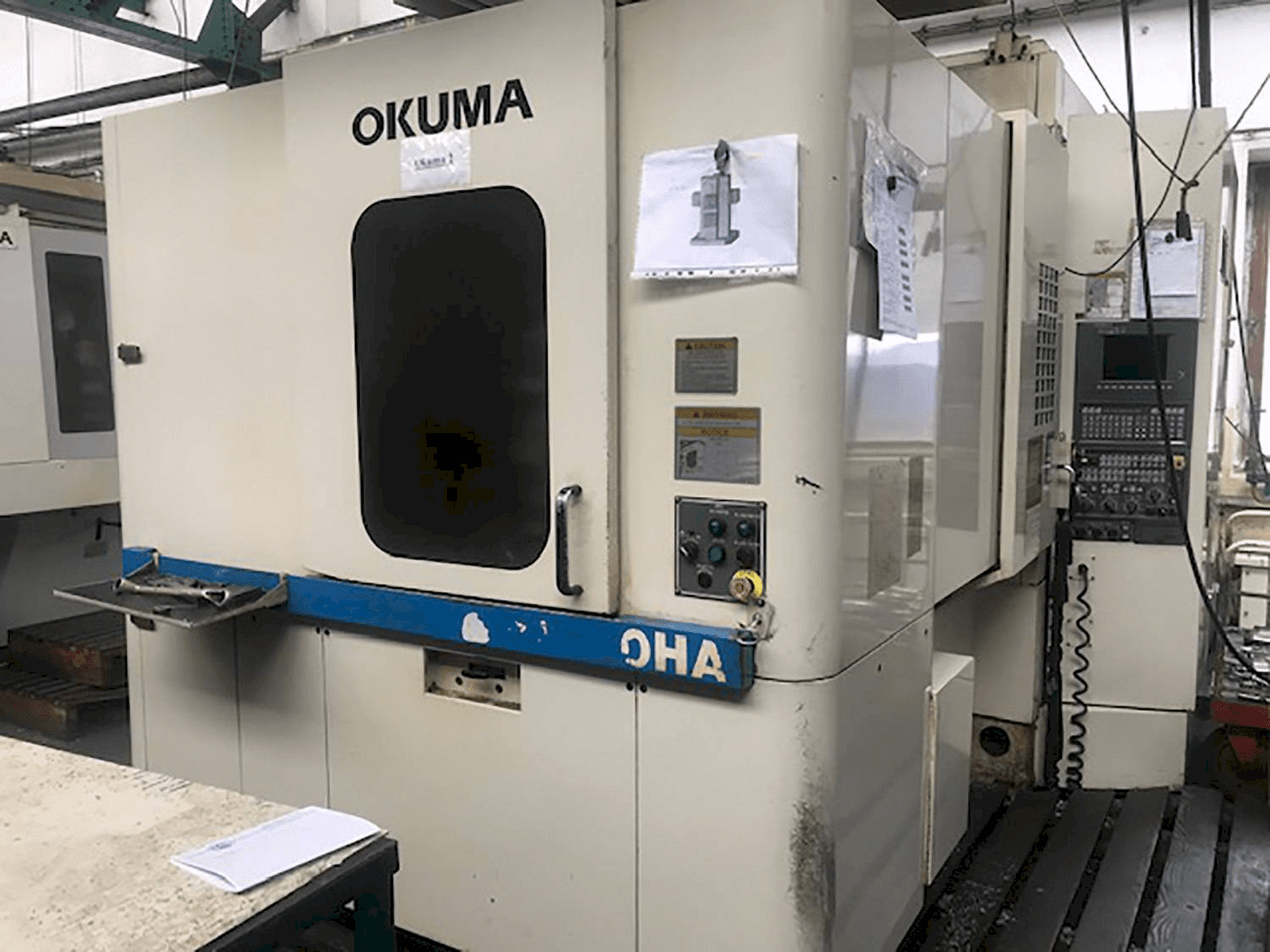 Mašīnas Okuma MX-40HA pretskats