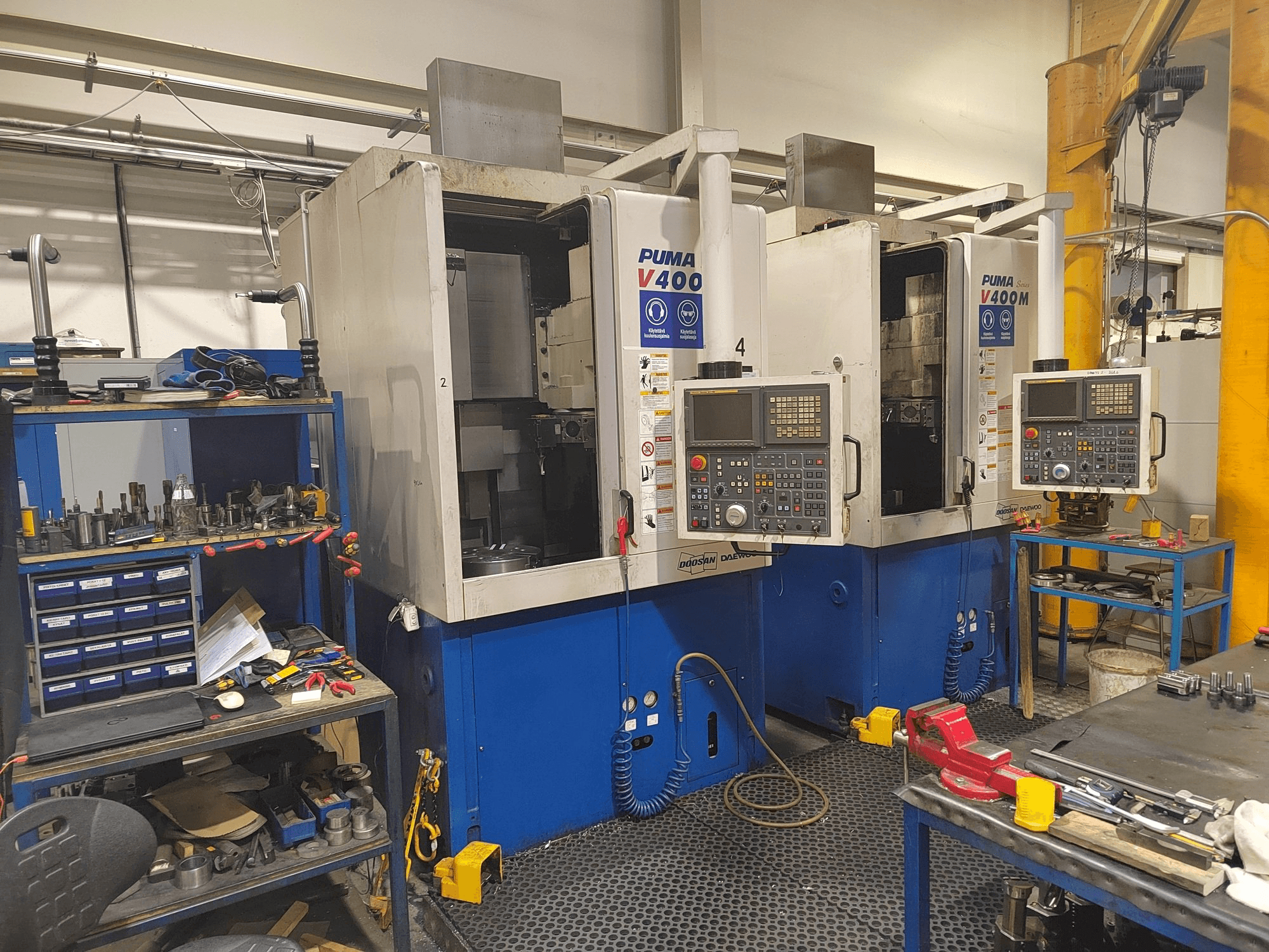 Mašīnas Doosan Puma V400M pretskats
