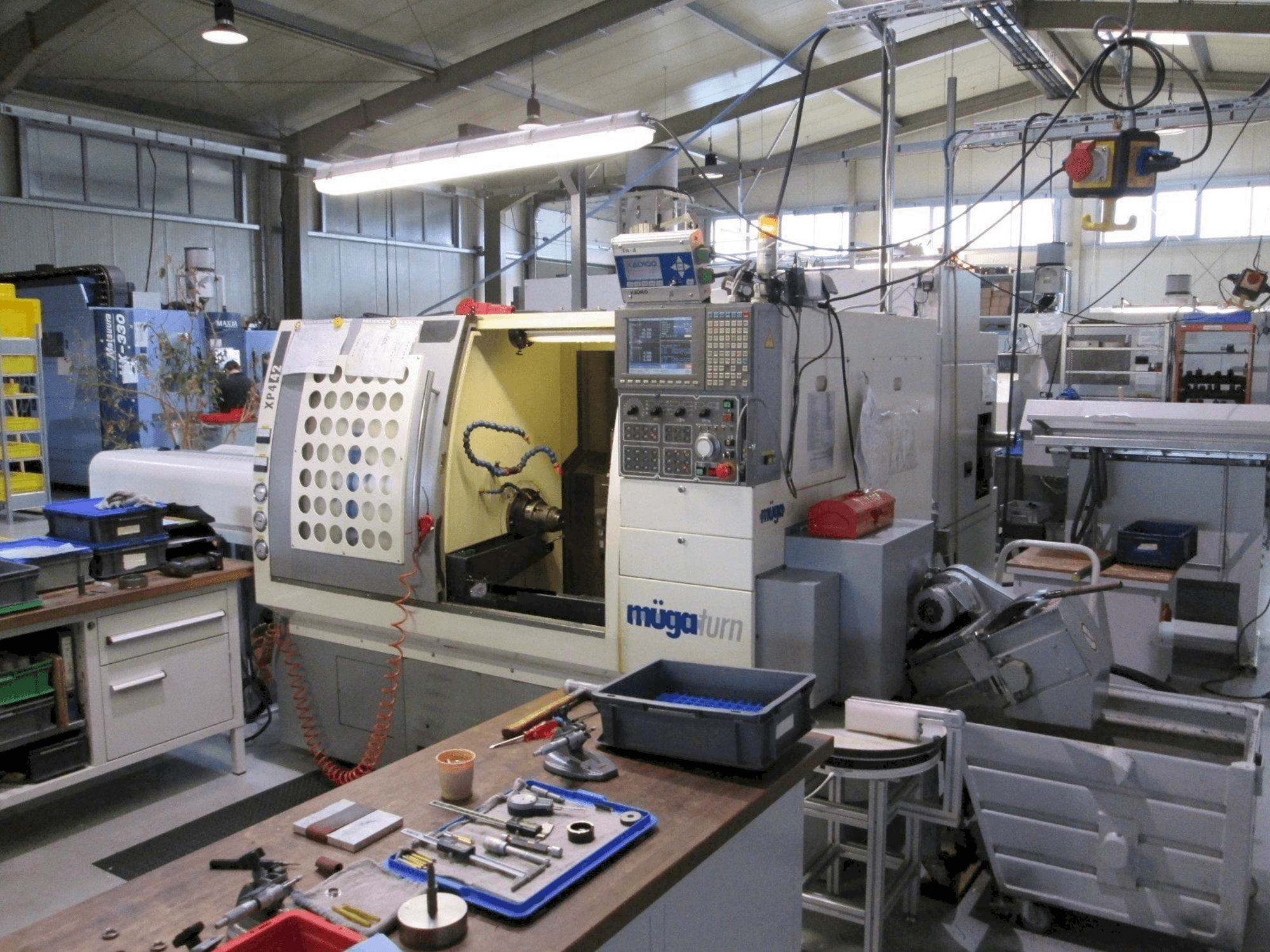 Mašīnas Muga XP4 – 42SM pretskats