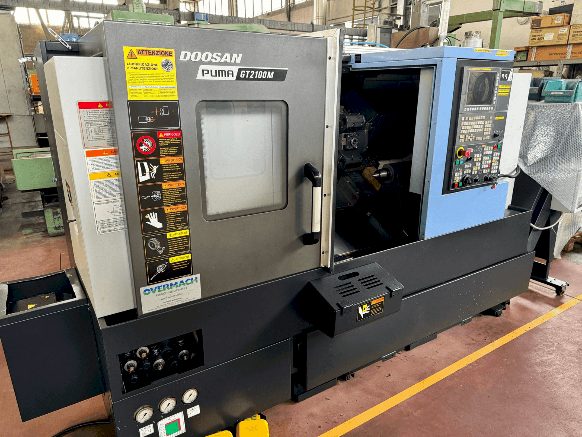 Mašīnas DOOSAN PUMA GT 2100M pretskats