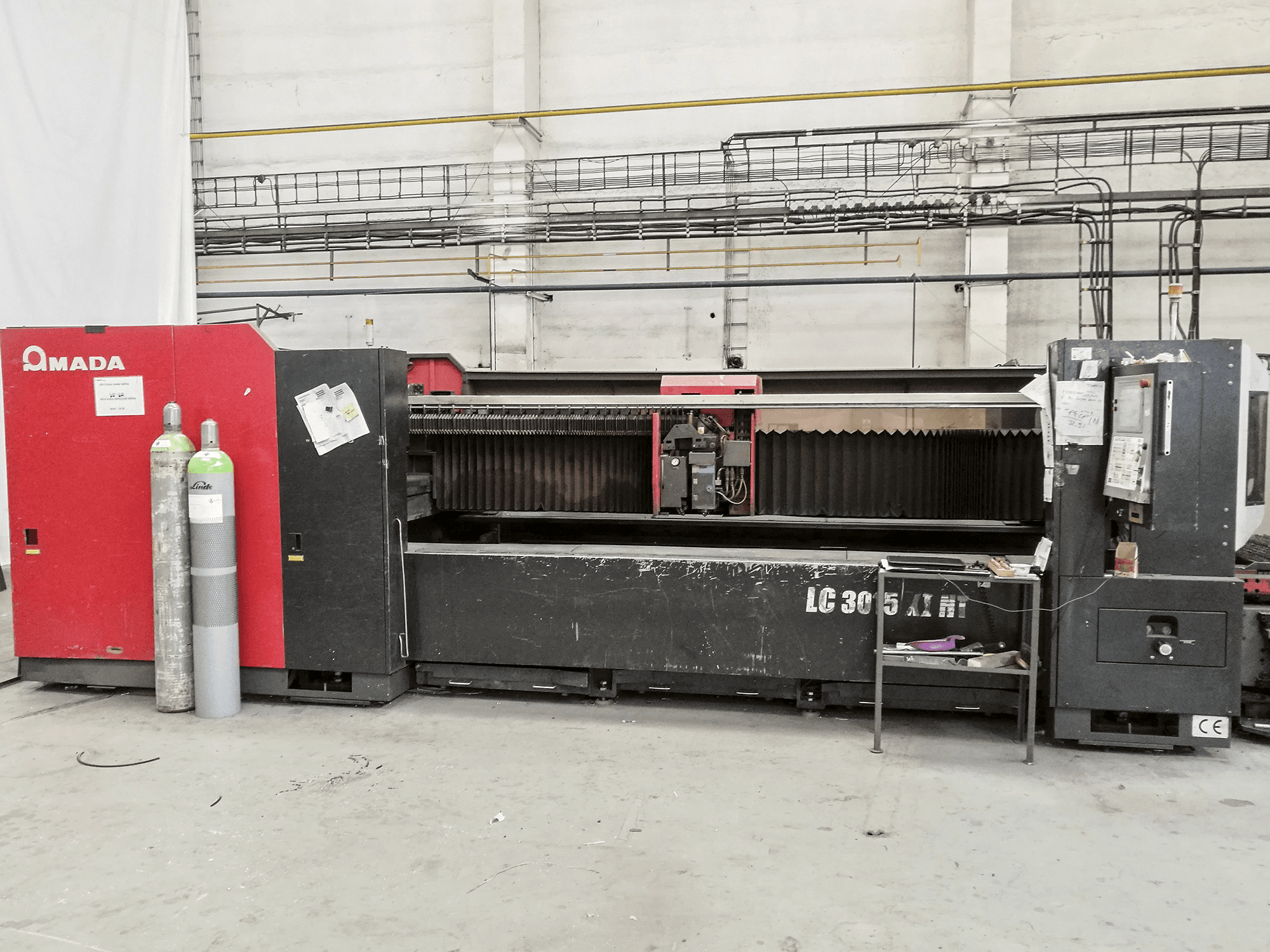 Mašīnas AMADA LC 3015 X1 NT pretskats