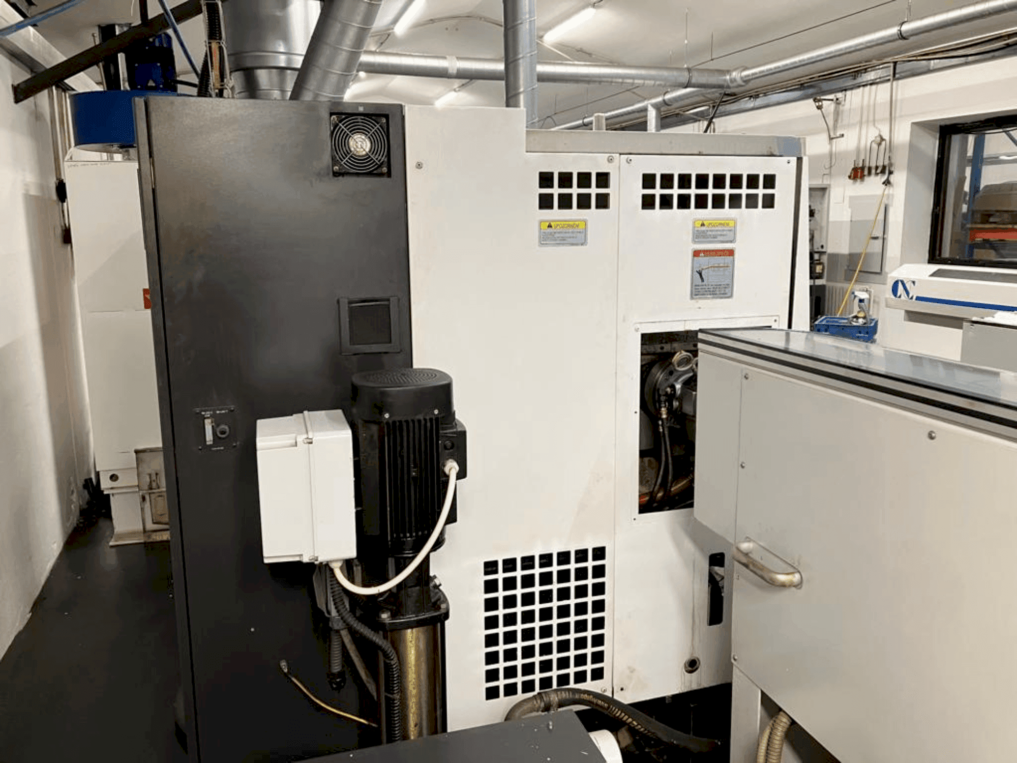 Mašīnas Okuma LB2000EXII MC pretskats