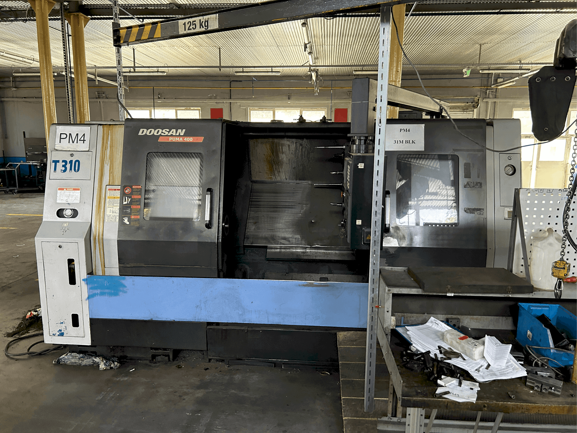 Mašīnas DOOSAN puma 400 B pretskats