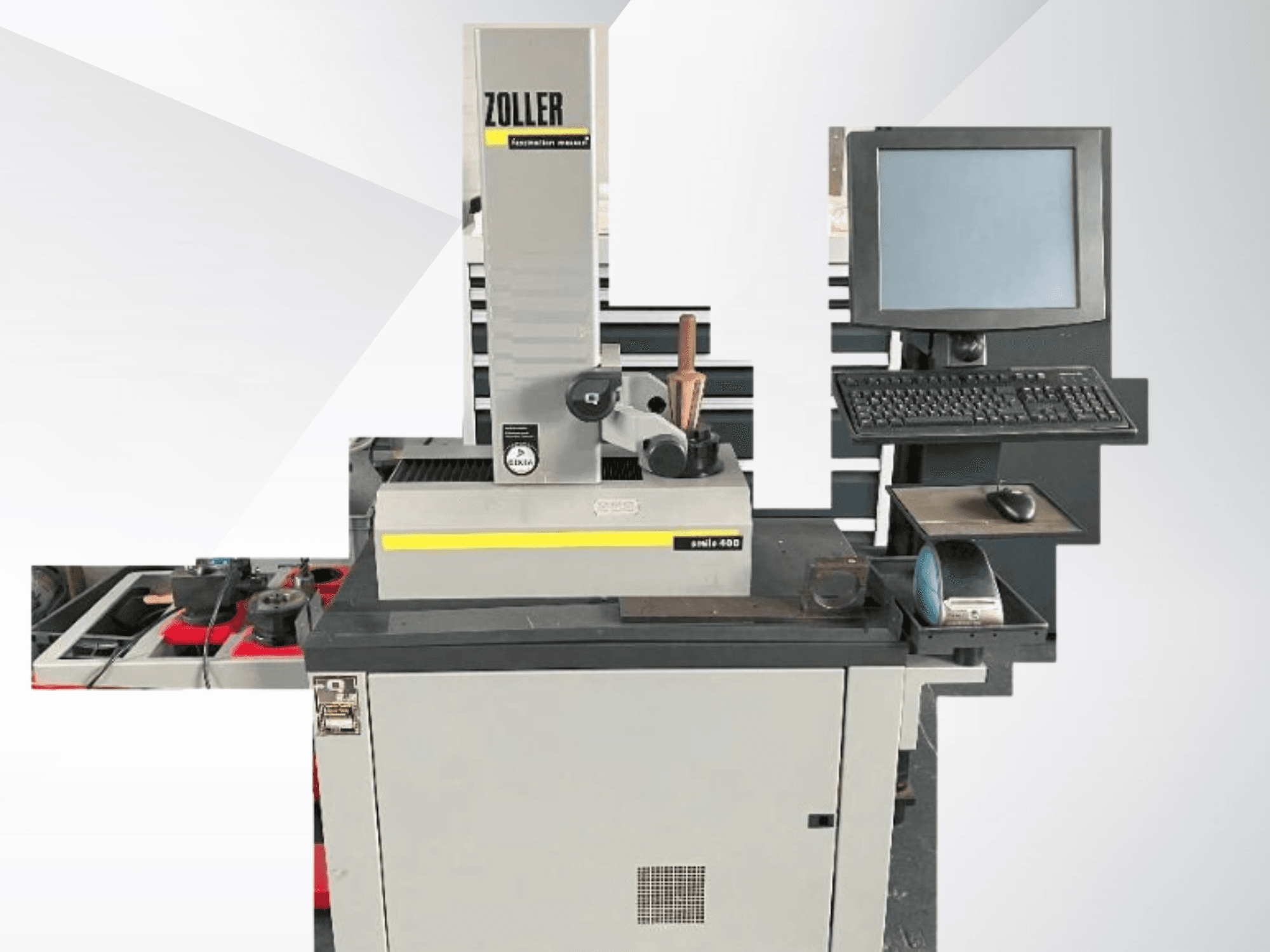 ZOLLER mērīšanas iekārta ar datora monitoru, tastatūru un instrumentiem; priekšējais skats, kurā redzama pelēkā krāsa un moderns dizains.