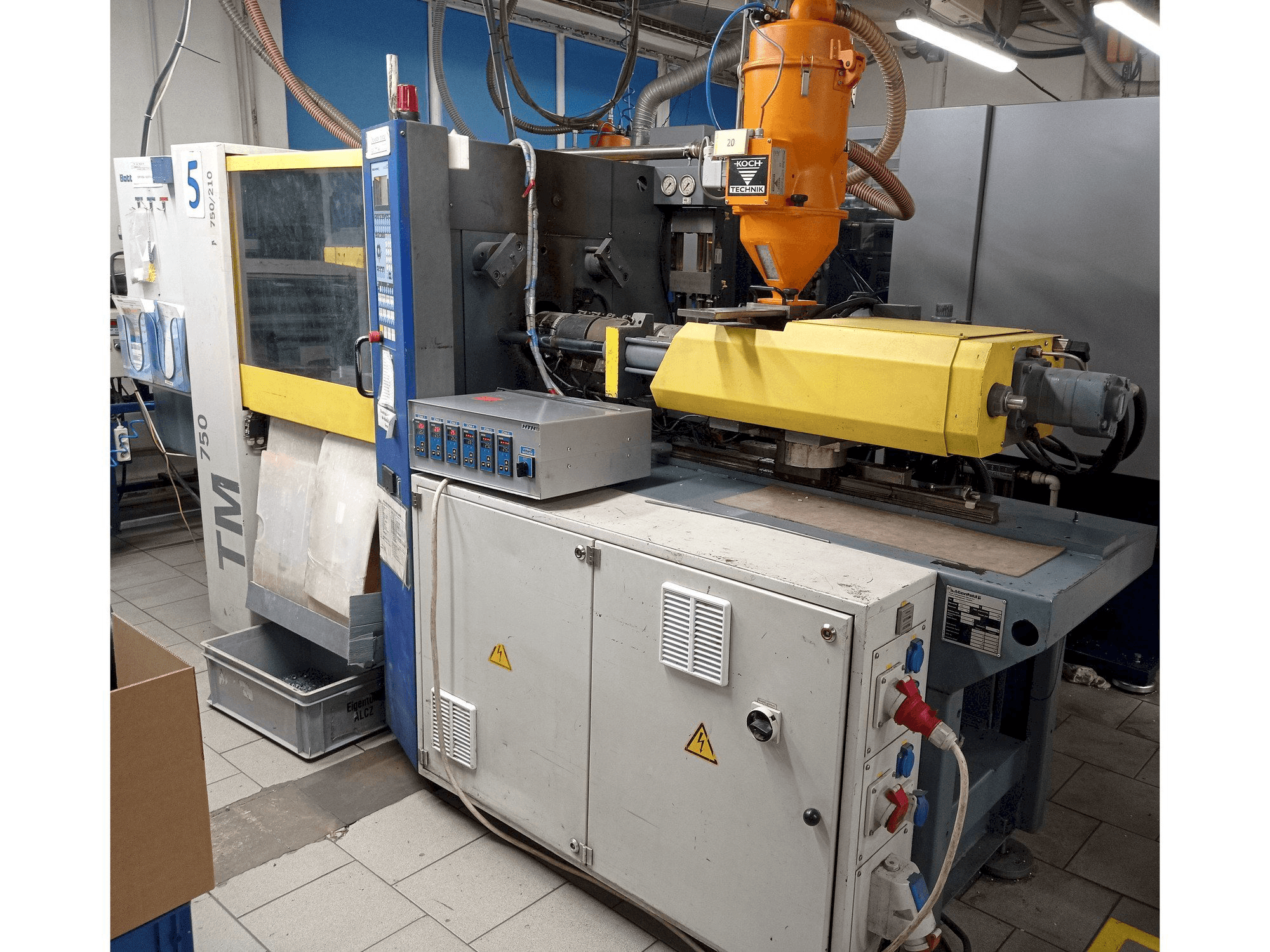 Mašīnas Battenfeld TM 750/210 pretskats