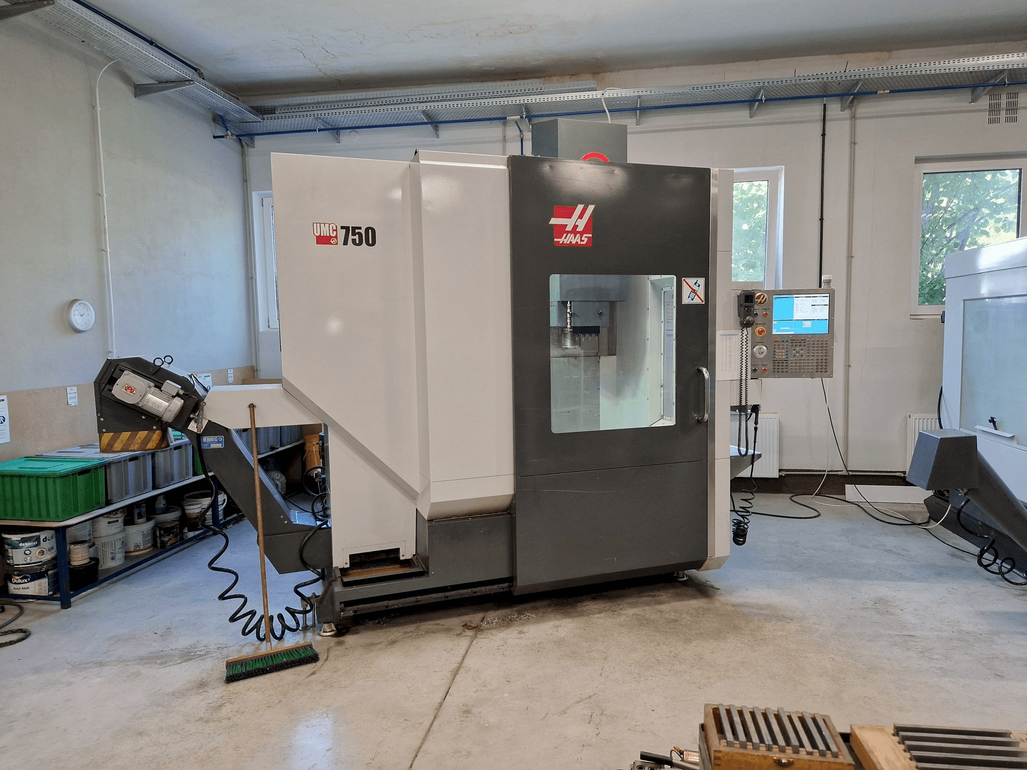 Mašīnas HAAS UMC-750 pretskats