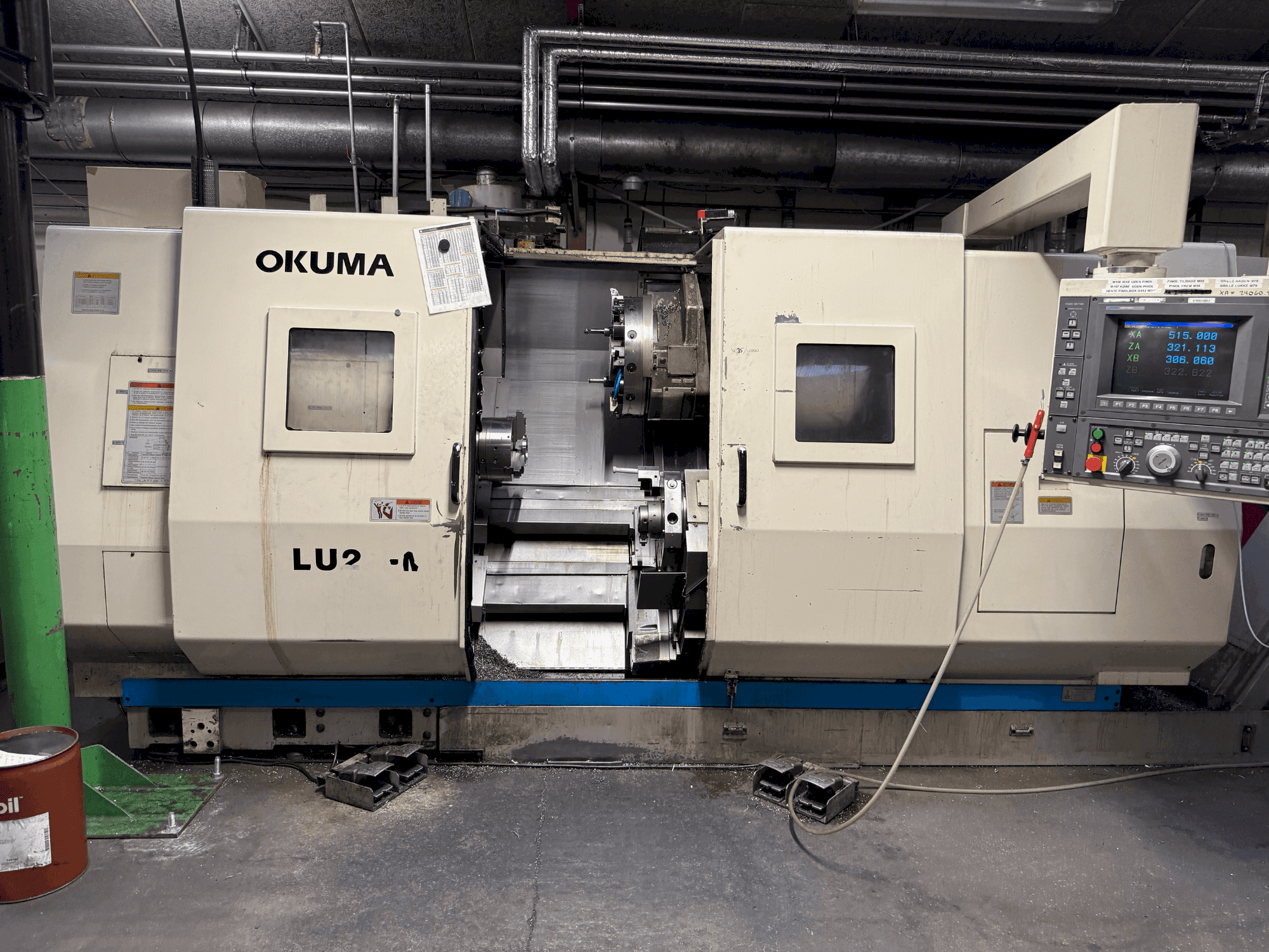 Mašīnas Okuma LU2-M pretskats