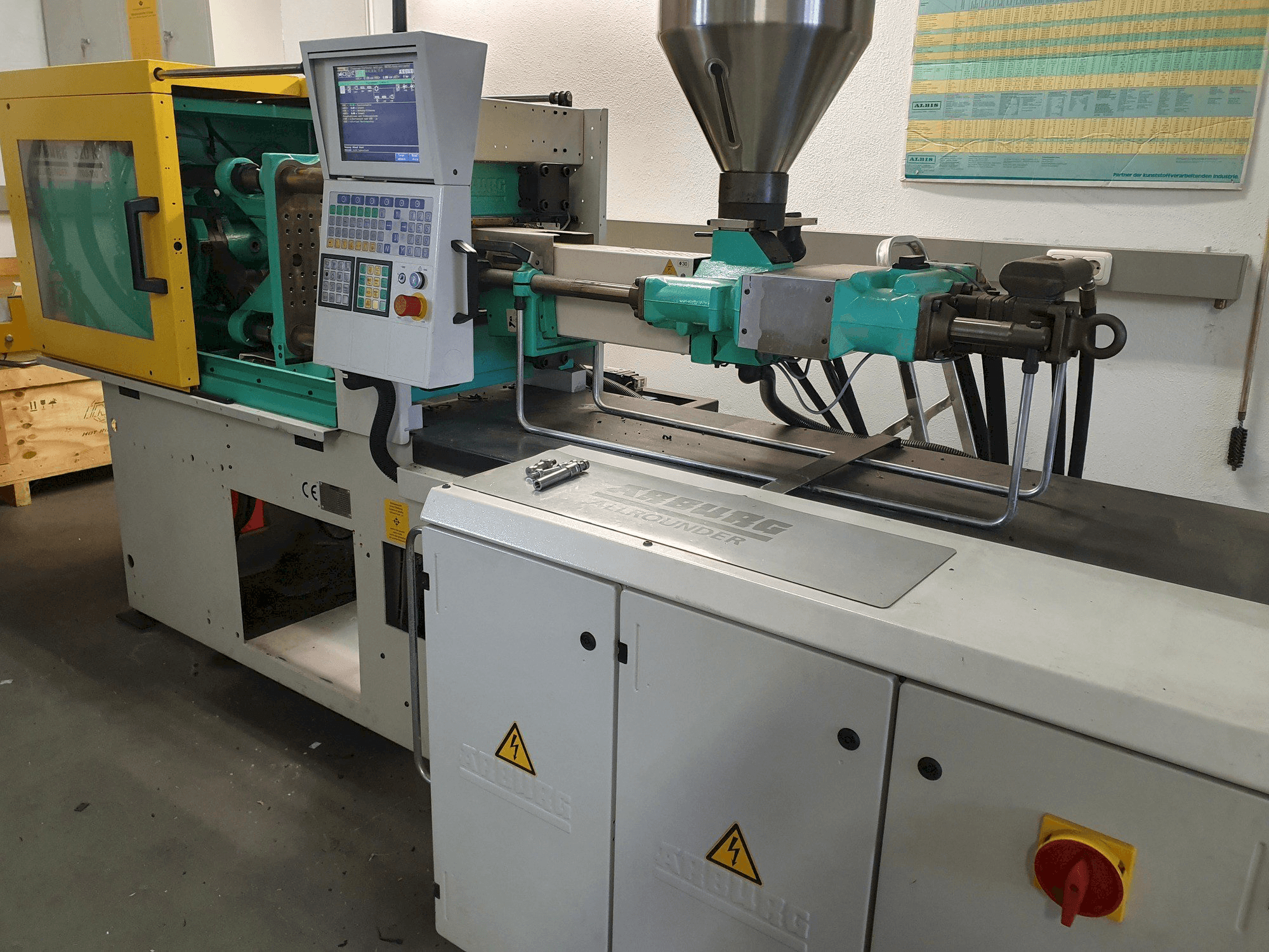 Mašīnas Arburg Allrounder 320 KS 700-100 pretskats