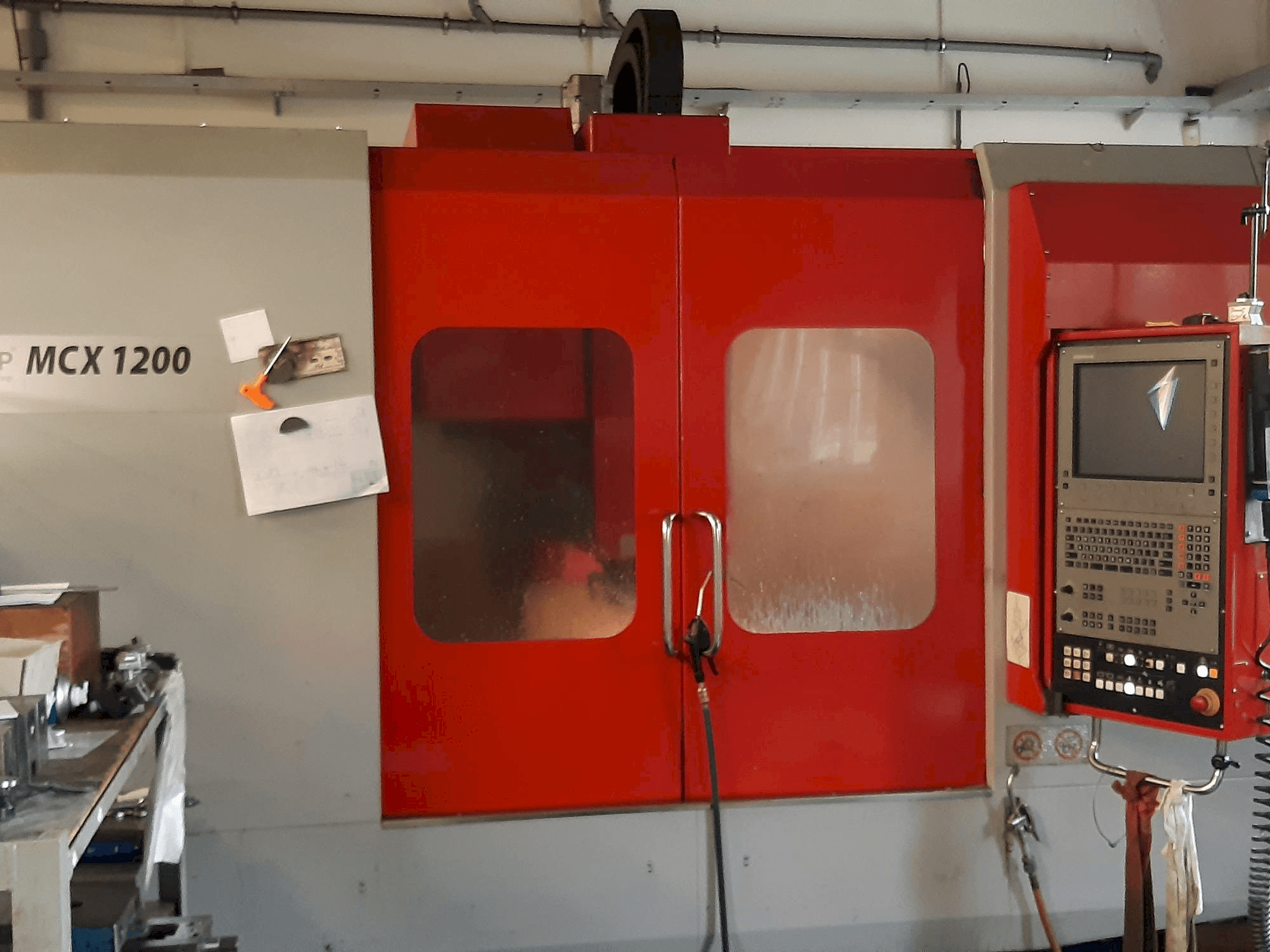 Mašīnas EMCO MCX 1200 pretskats