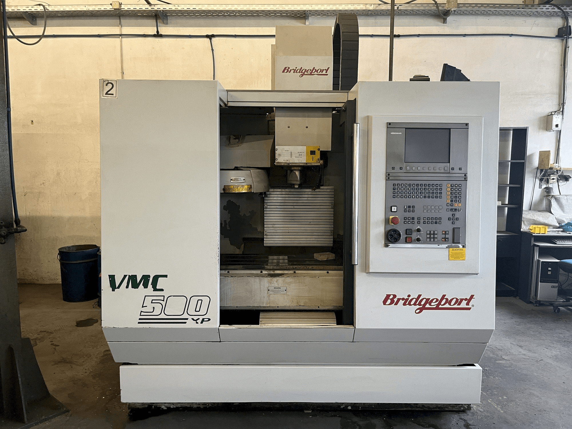 Mašīnas Bridgeport VMC500XP pretskats