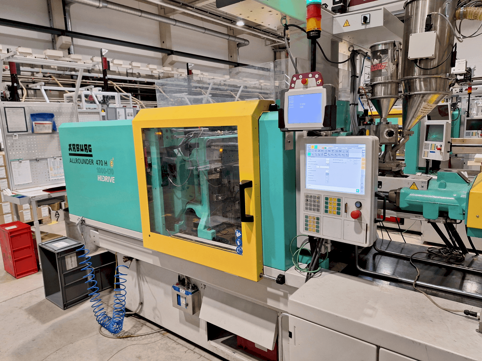 Mašīnas Arburg 470 H 1000-170 pretskats