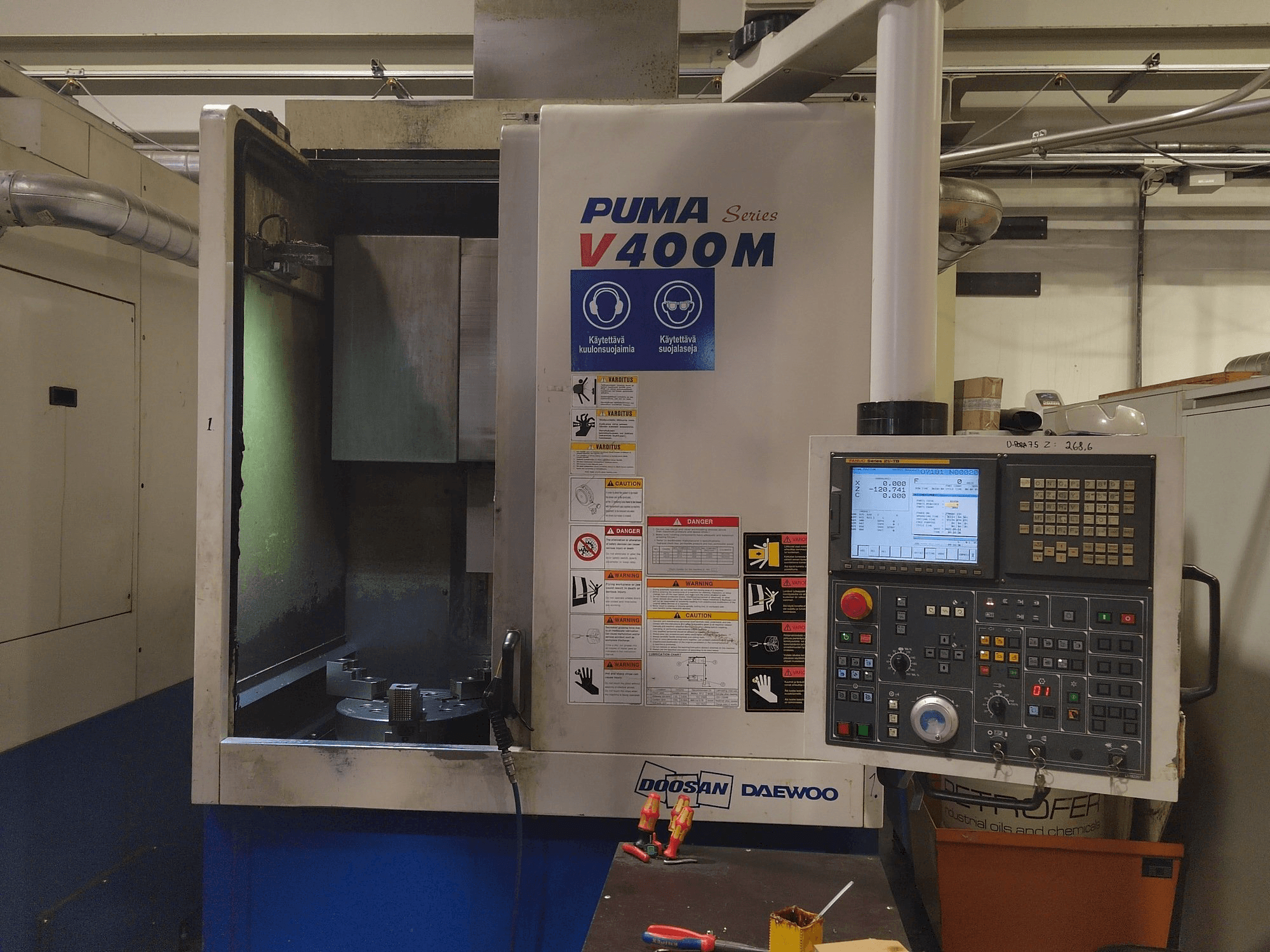 Mašīnas Doosan Puma V400M pretskats