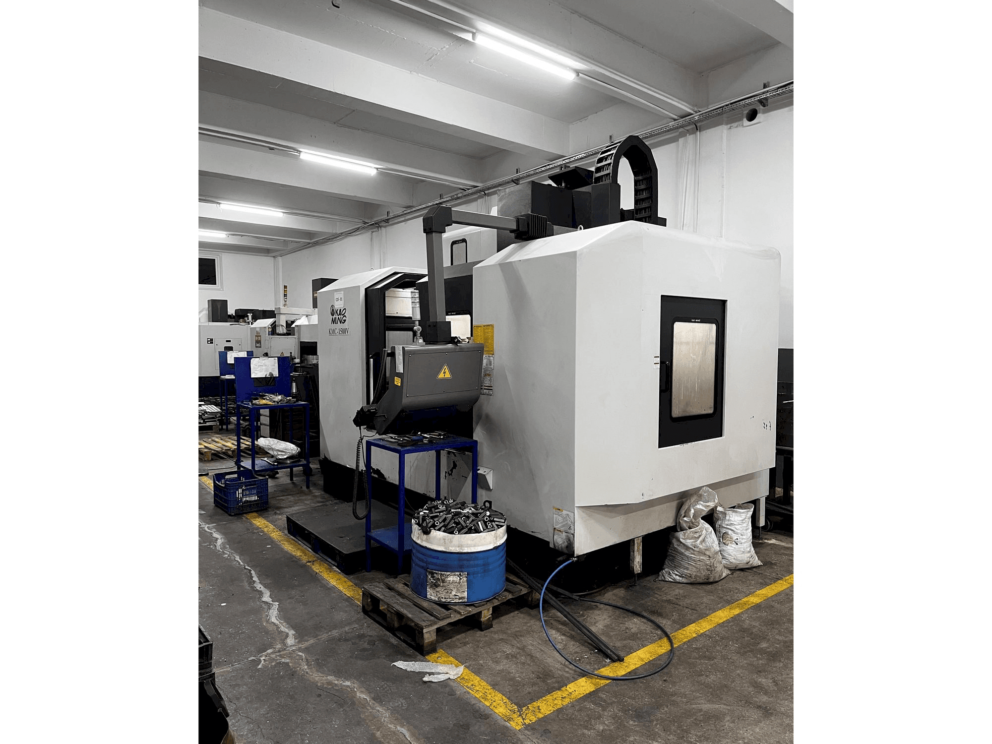 Mašīnas KAOMING KMC 1500V pretskats