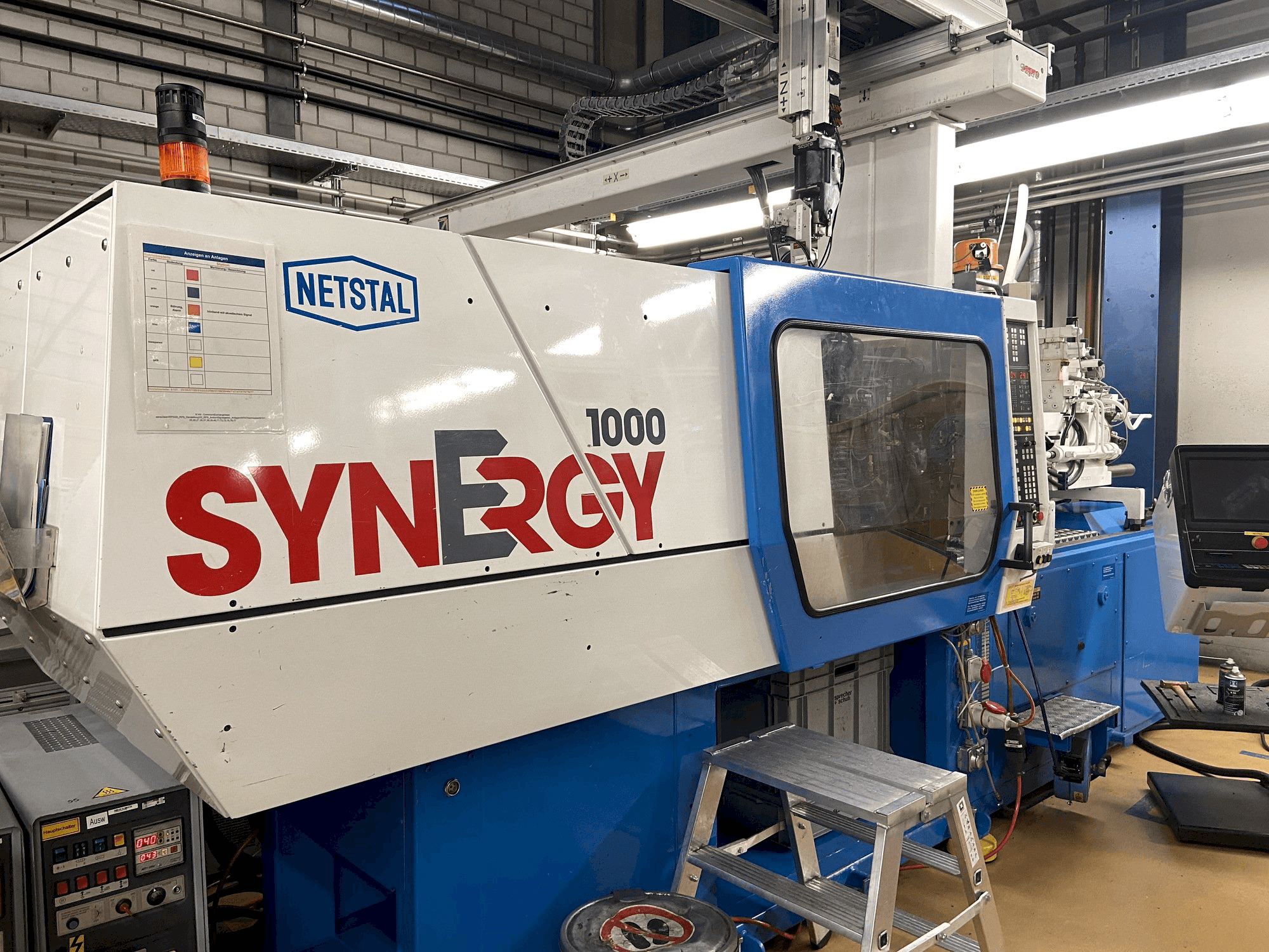 Mašīnas Netstal Synergy 1000-230 pretskats