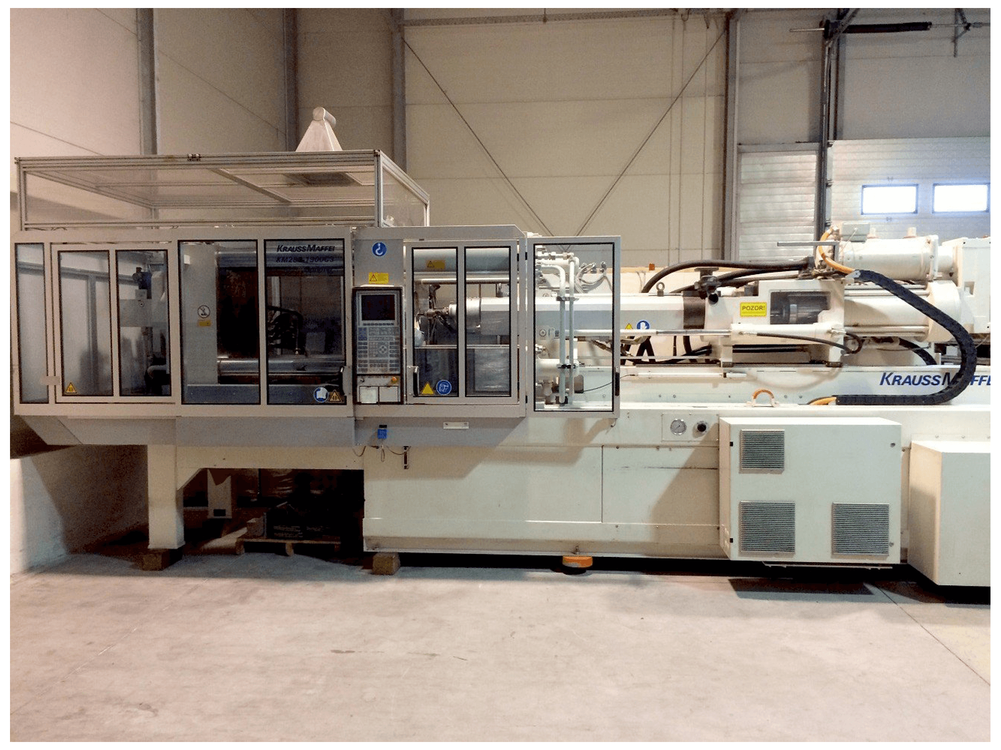 Mašīnas Krauss Maffei KM 280-1900 C3 pretskats
