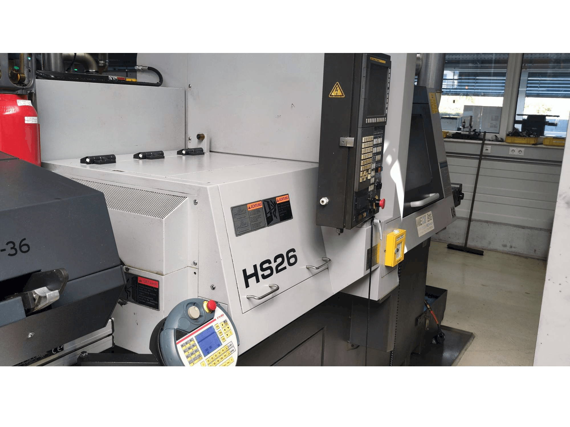 Mašīnas TSUGAMI HS26 kreisās malas skats