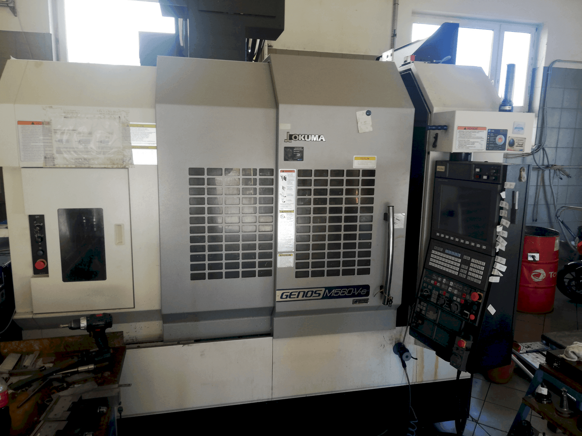 Mašīnas Okuma GENOS M560V-e pretskats