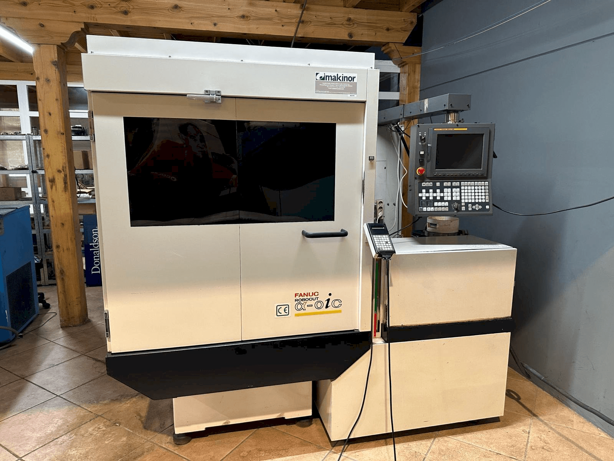 Mašīnas FANUC Robocut Alpha-0iC pretskats