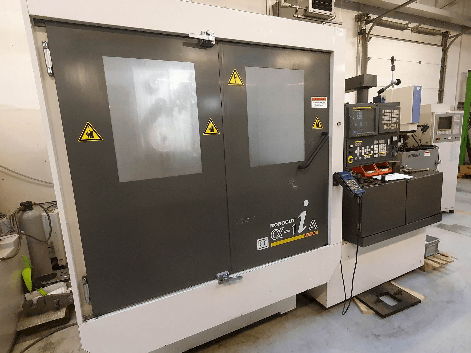 Mašīnas FANUC Robocut Alpha-1iA pretskats