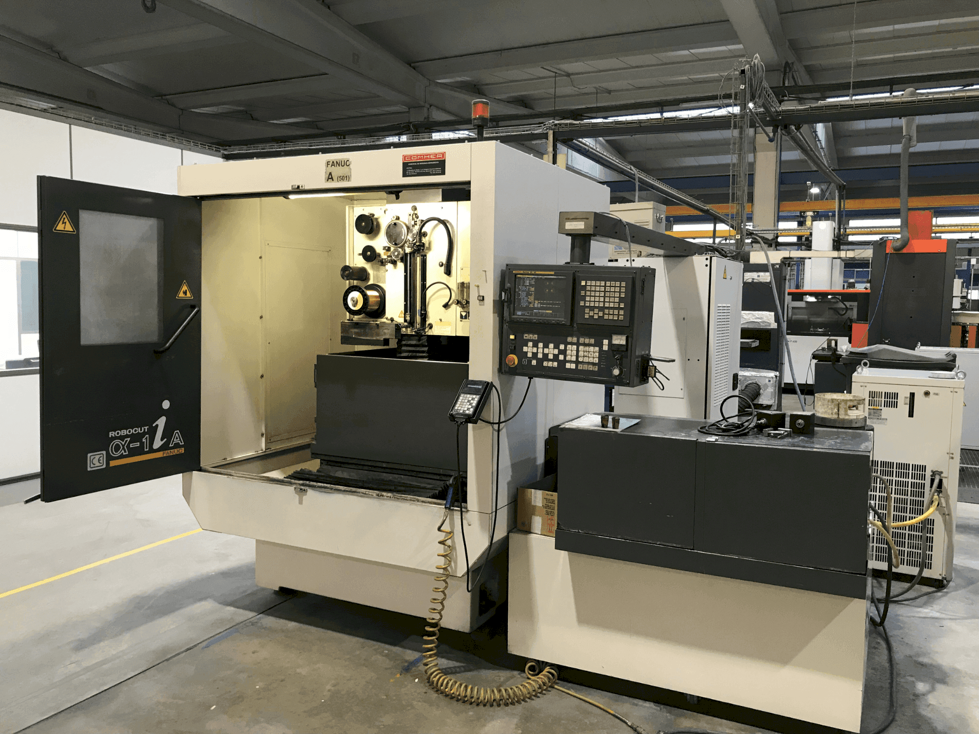 Mašīnas FANUC ROBOCUT α-1iA pretskats