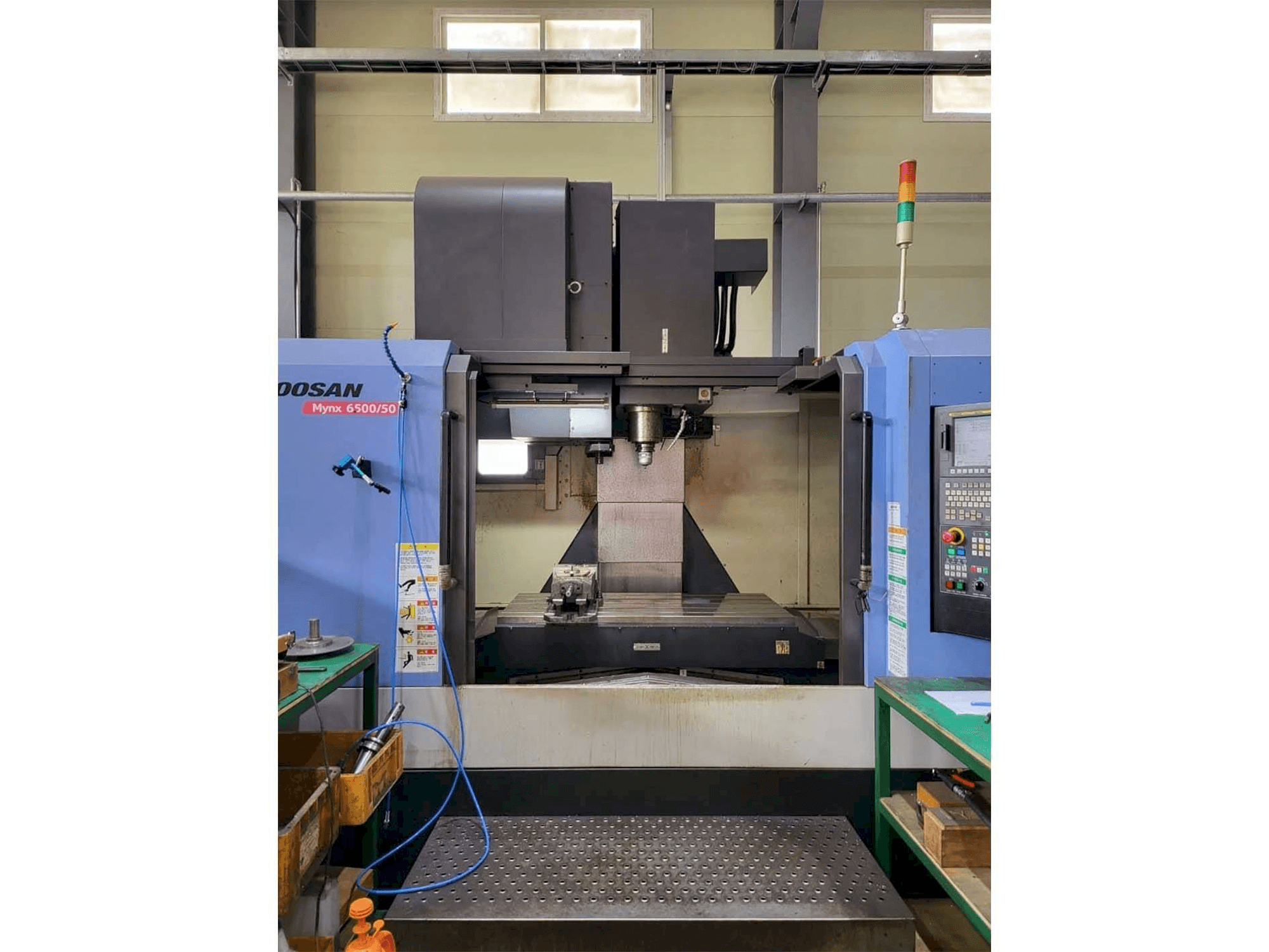 Mašīnas Doosan MYNX 6500/50 pretskats