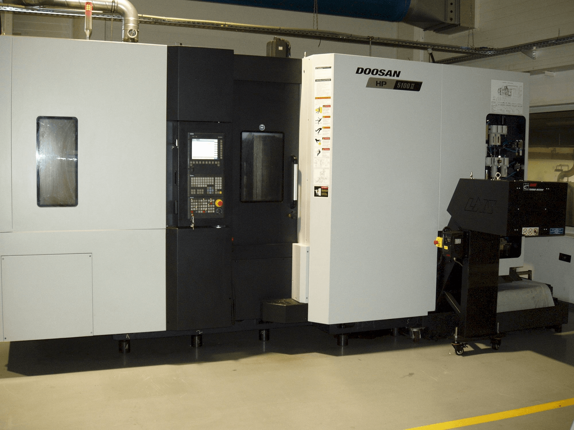 Mašīnas Doosan HP 5100 II pretskats
