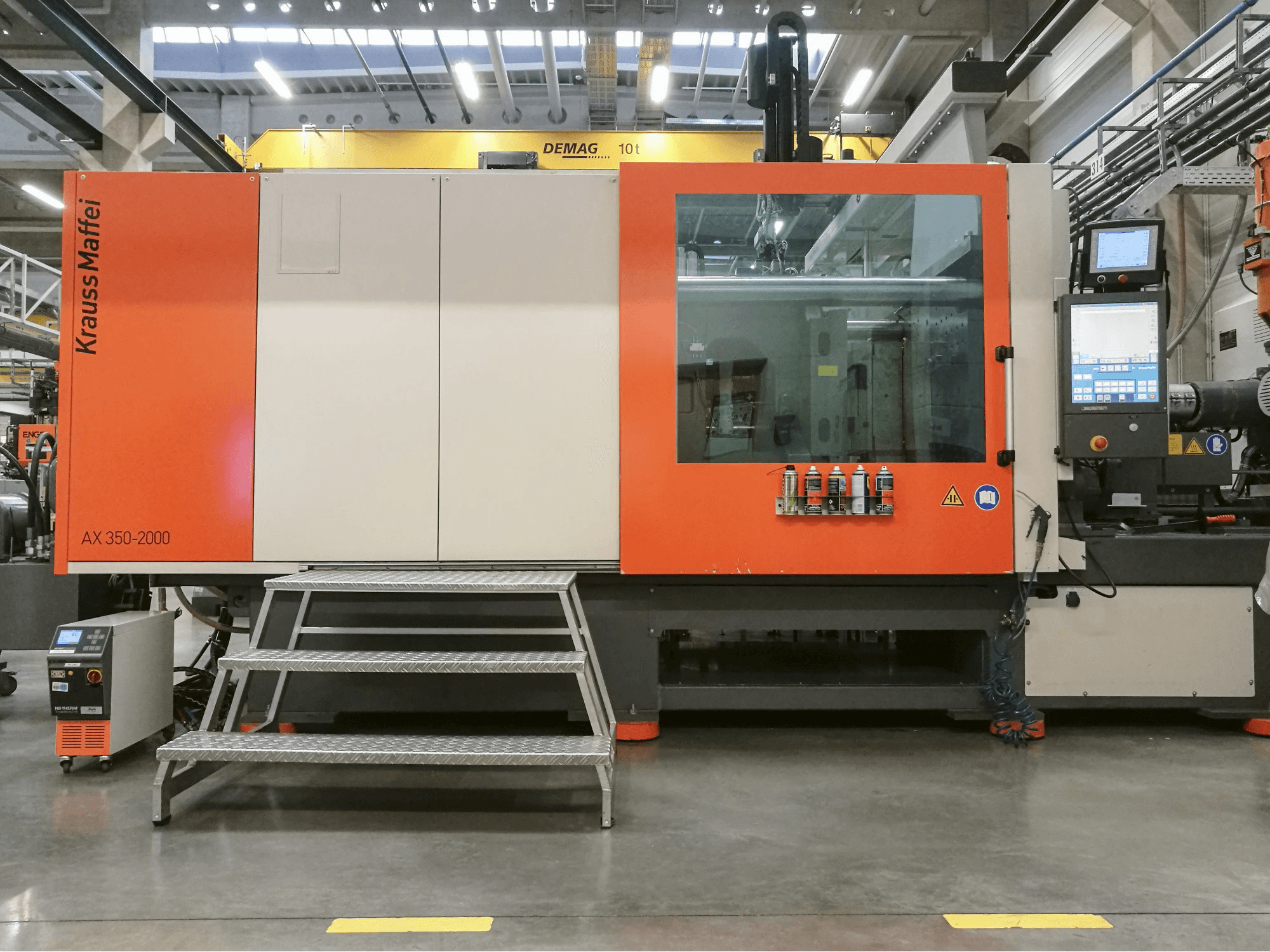 Mašīnas Krauss Maffei 350-2000 AX pretskats