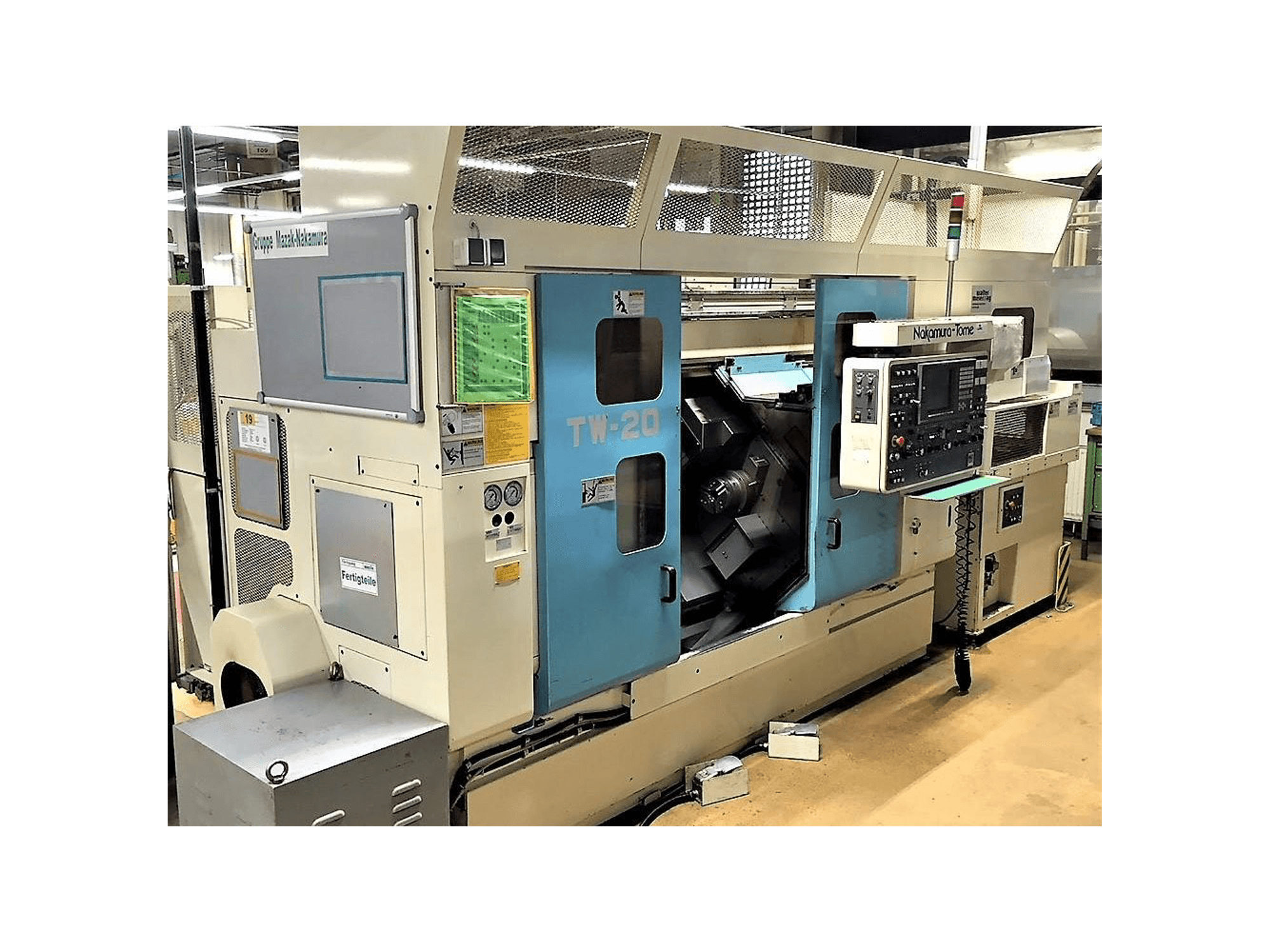 Mašīnas NAKAMURA-TOME TW-20 skats no kreisās puses