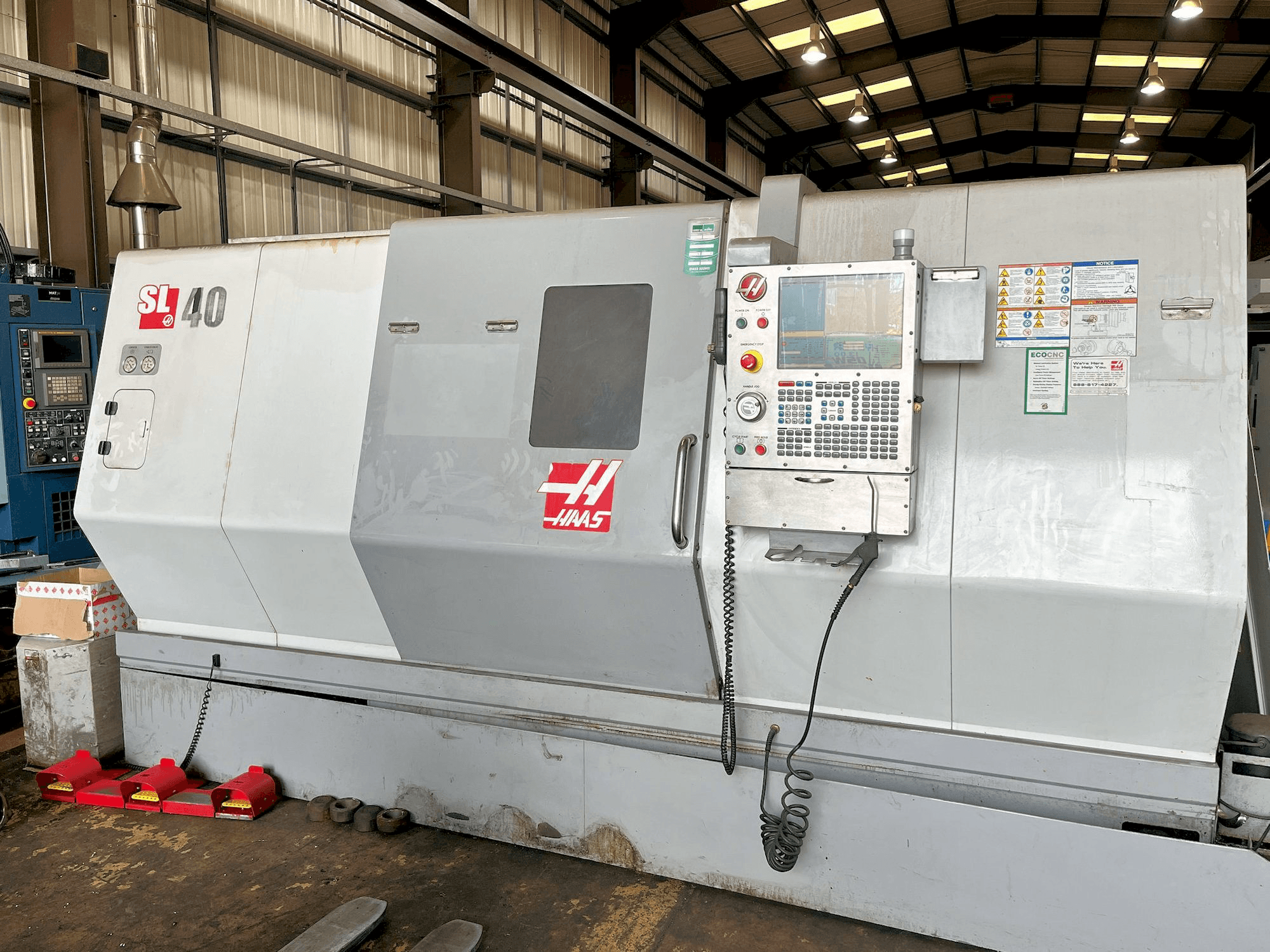 Mašīnas HAAS SL-40 pretskats