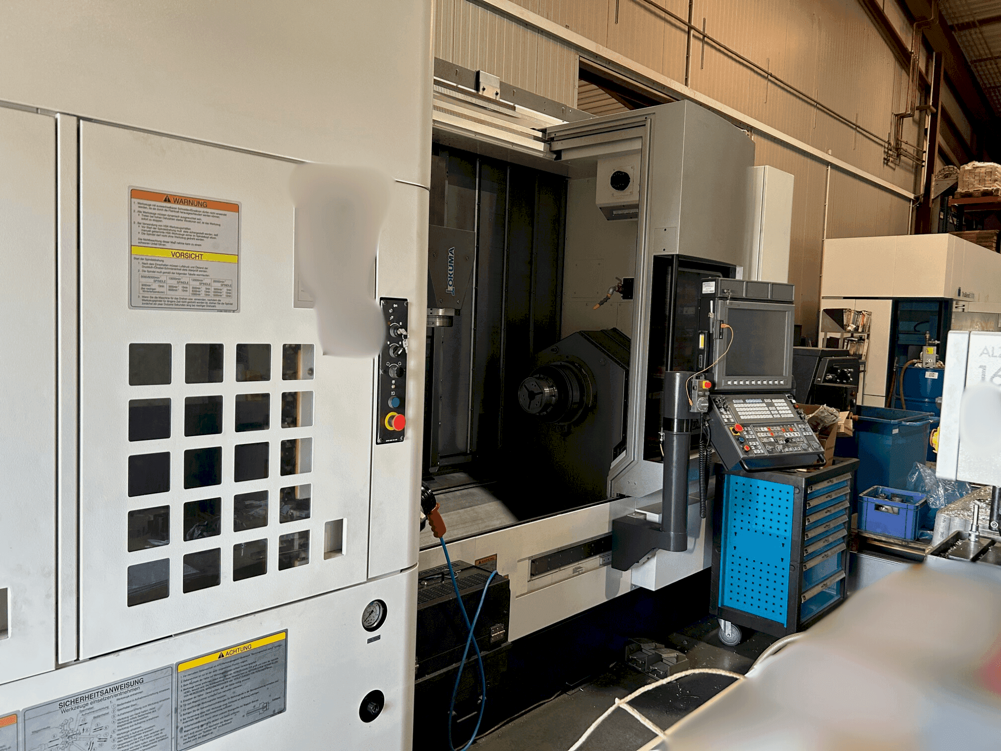 Mašīnas Okuma Multus U3000 1SW 1500 pretskats