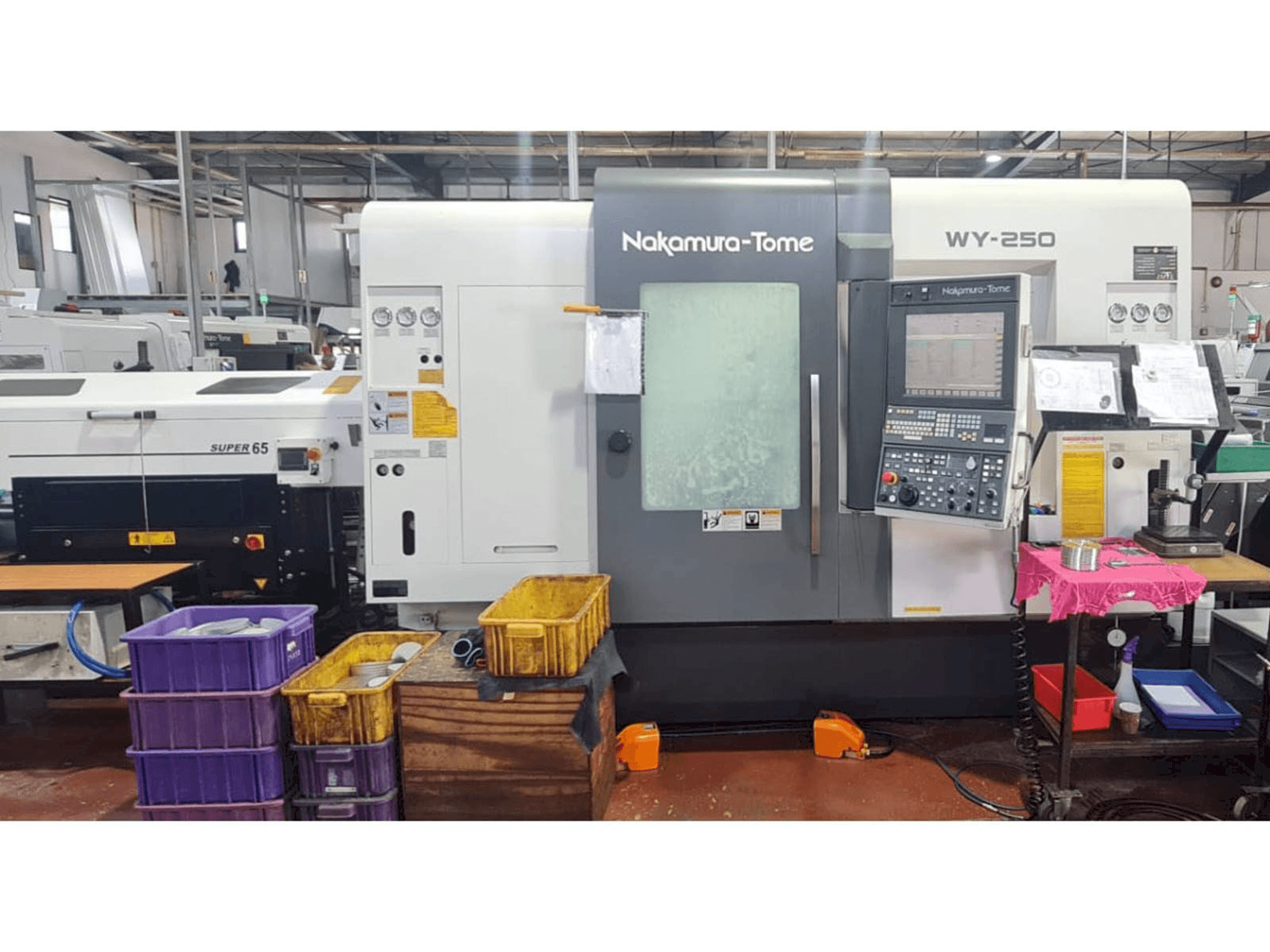 Mašīnas NAKAMURA-TOME WY 250 pretskats