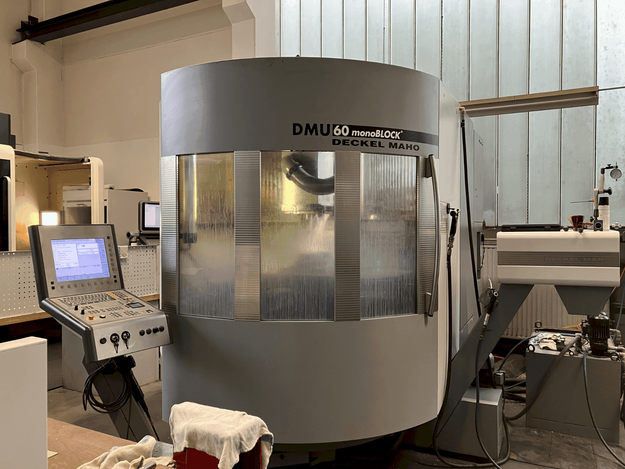 Mašīnas DMG DMU 60 monoBlock pretskats