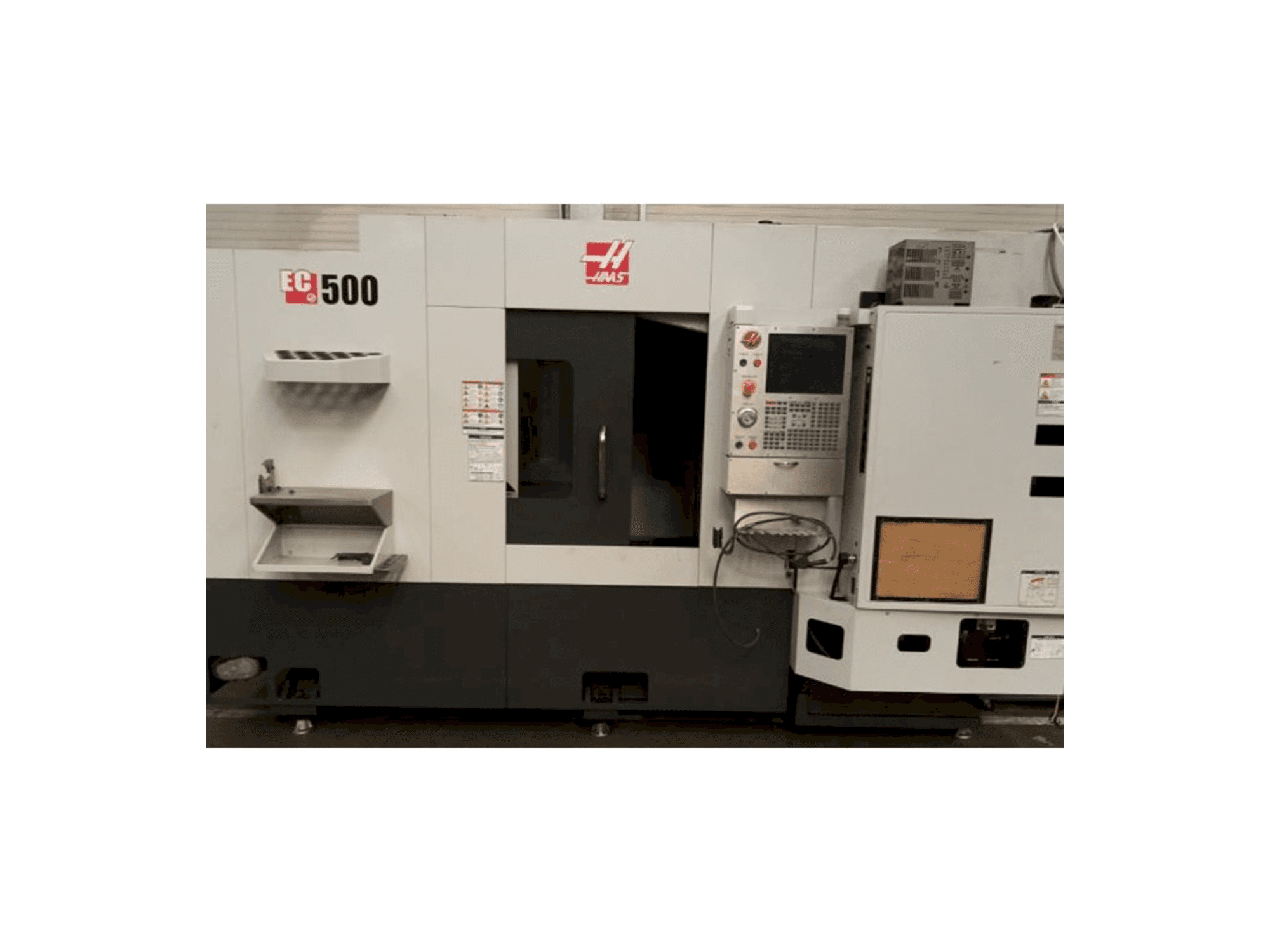 Mašīnas HAAS EC-500 pretskats