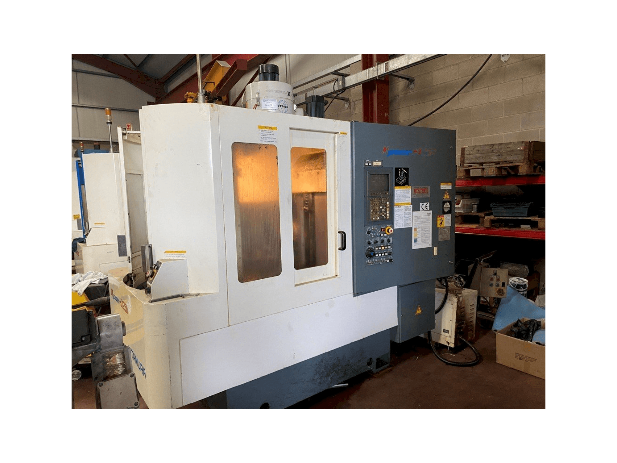 Mašīnas Kitamura Mycenter HX250 pretskats