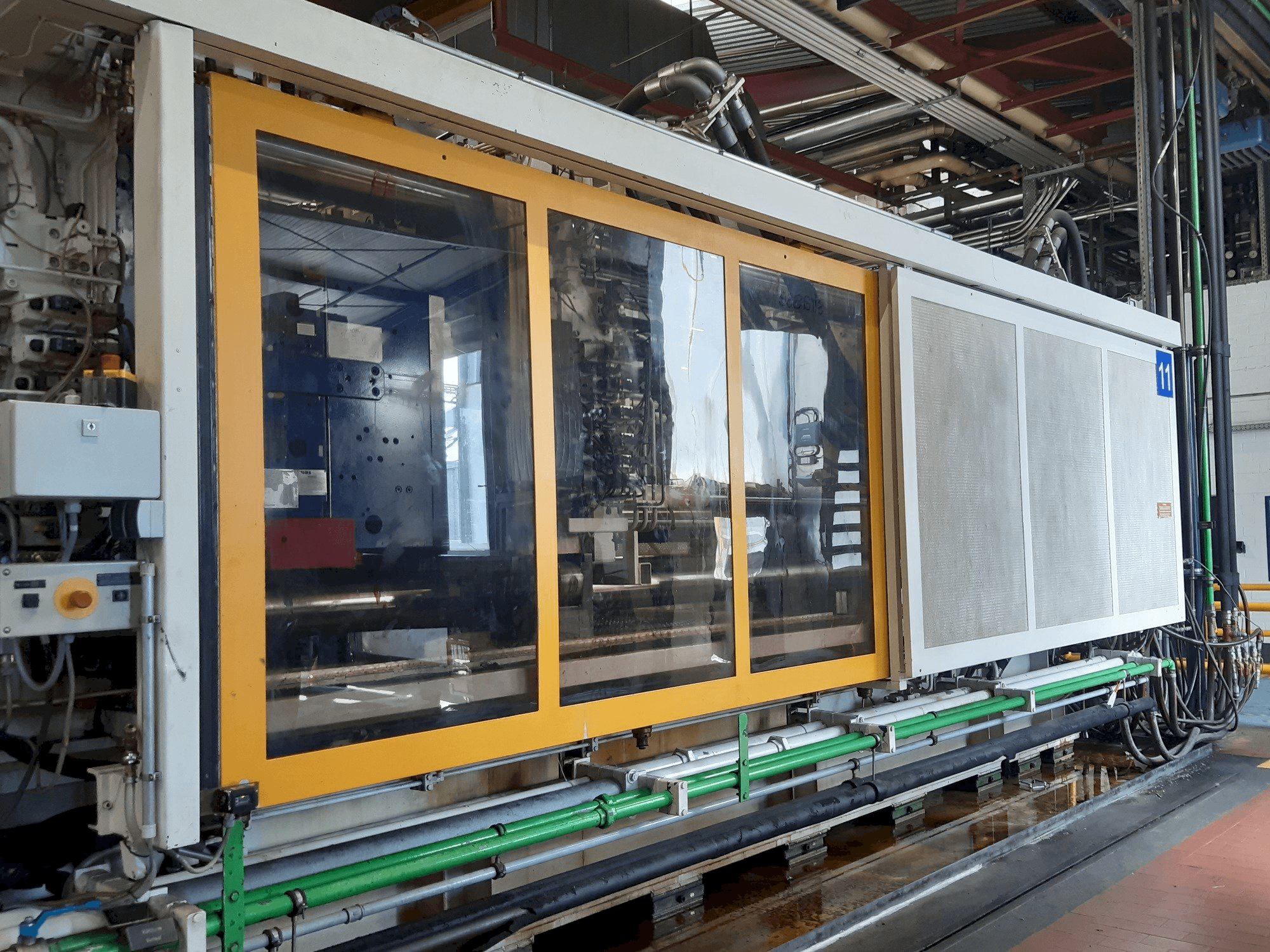 Mašīnas Krauss Maffei 1300-8000 M pretskats