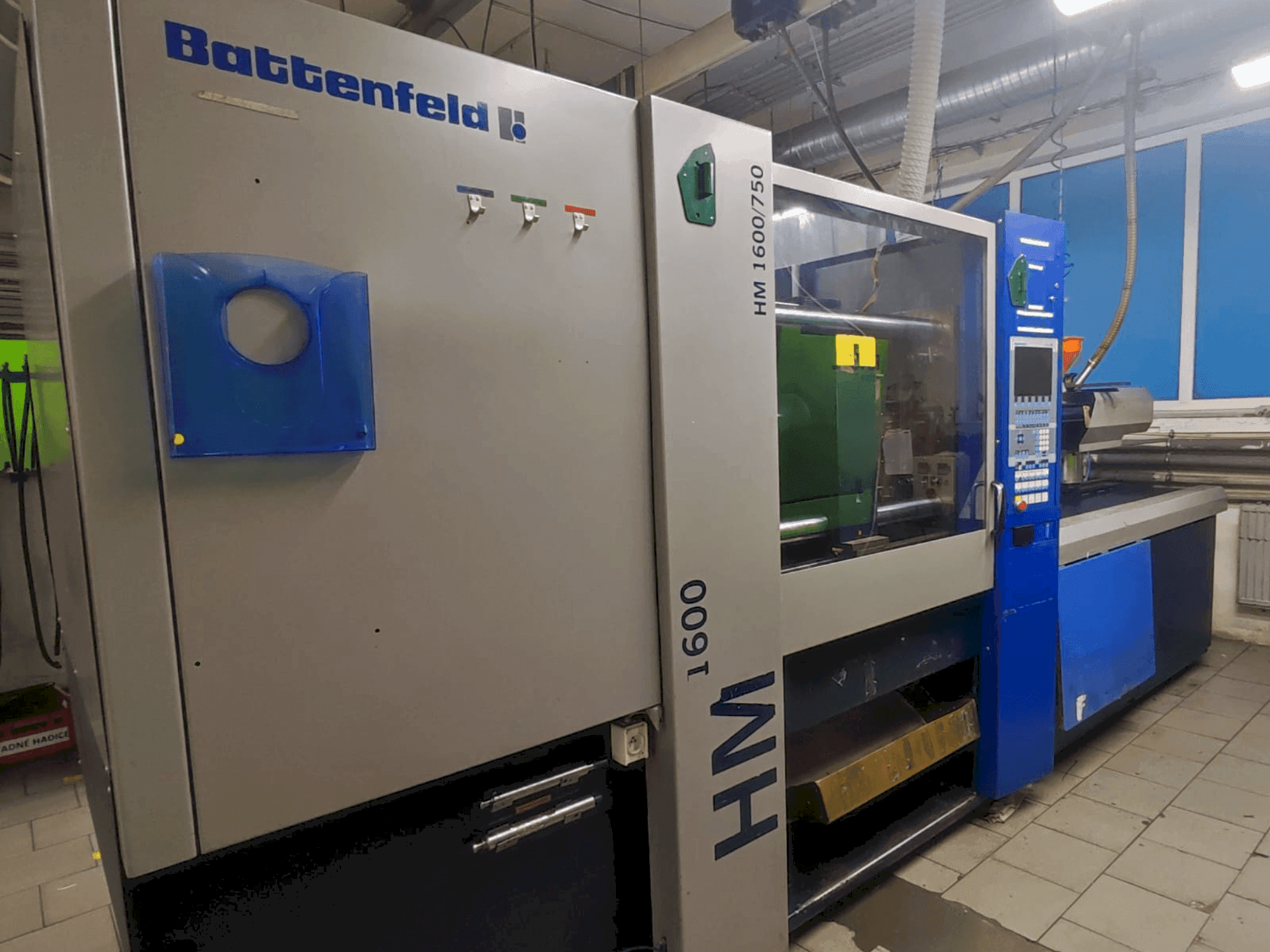 Mašīnas Battenfeld HM 1600/750 pretskats