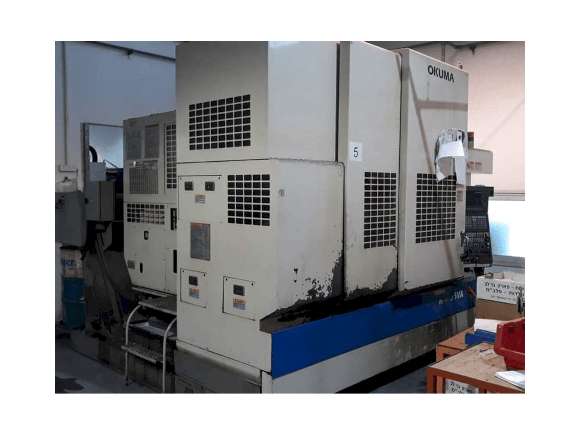 Mašīnas Okuma MX-55 VA pretskats