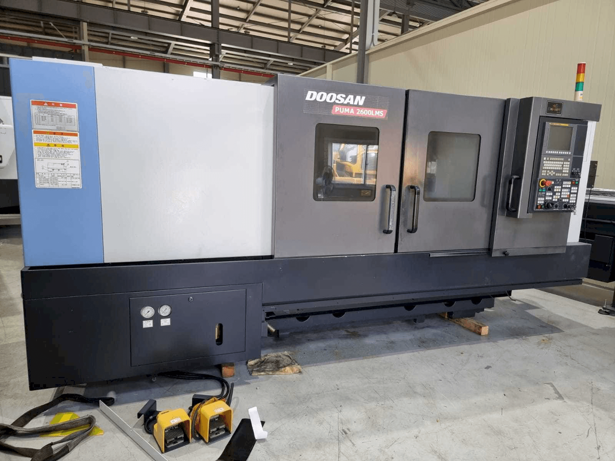 Mašīnas Doosan PUMA 2600LMS pretskats