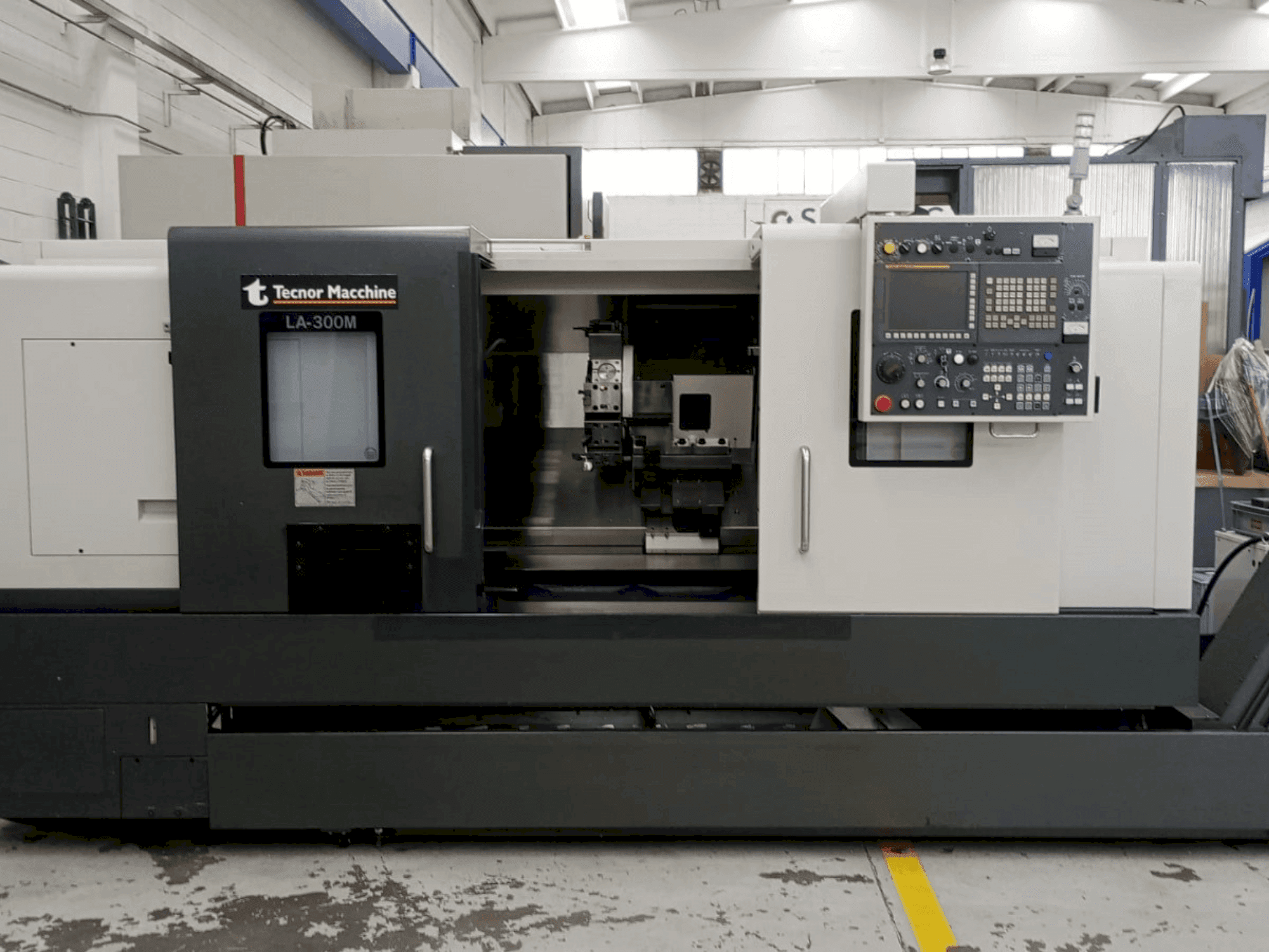 Mašīnas Takisawa LA-300 CNC pretskats