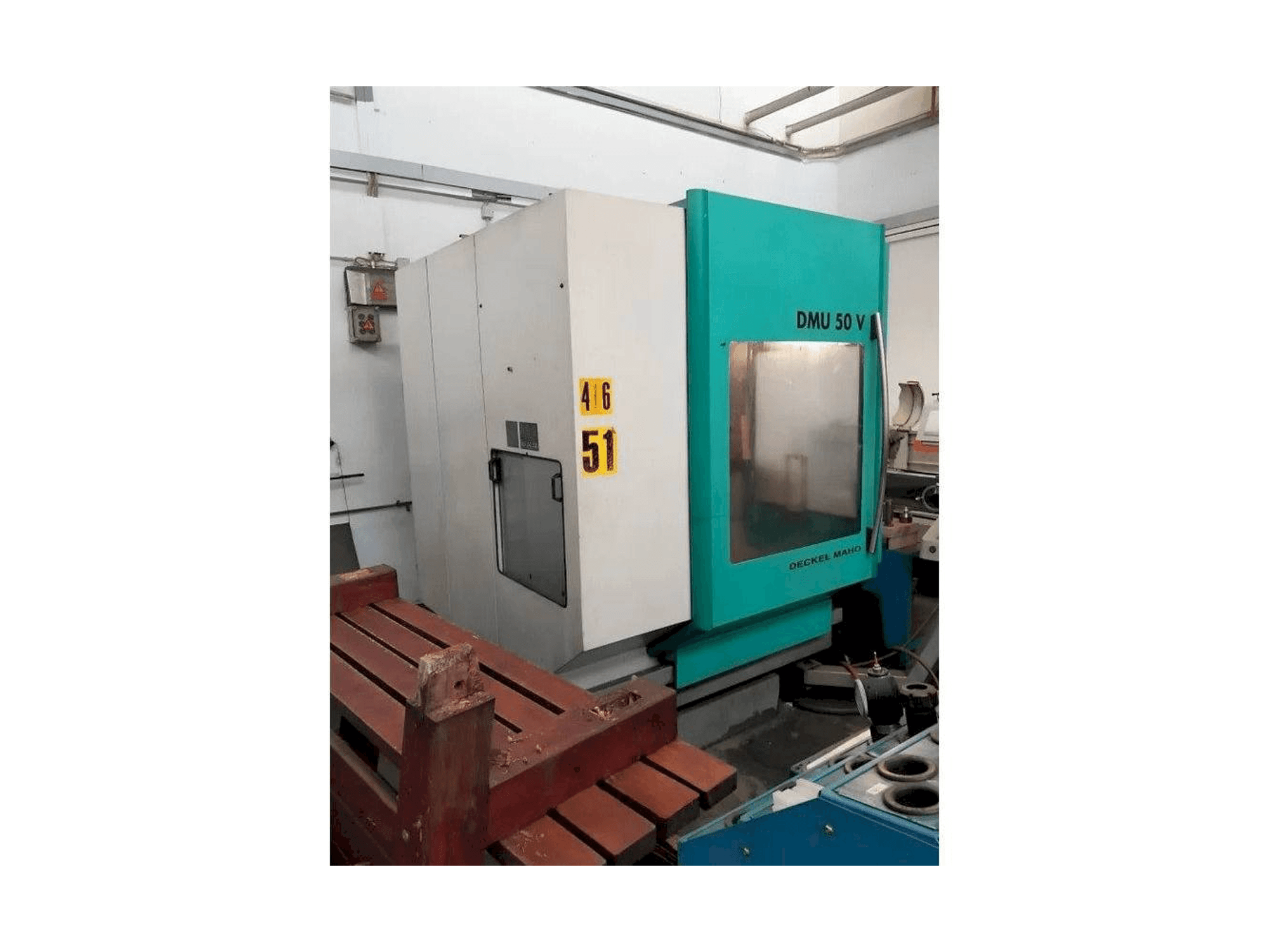 Mašīnas DECKEL MAHO DMU 50 V kreisās malas skats
