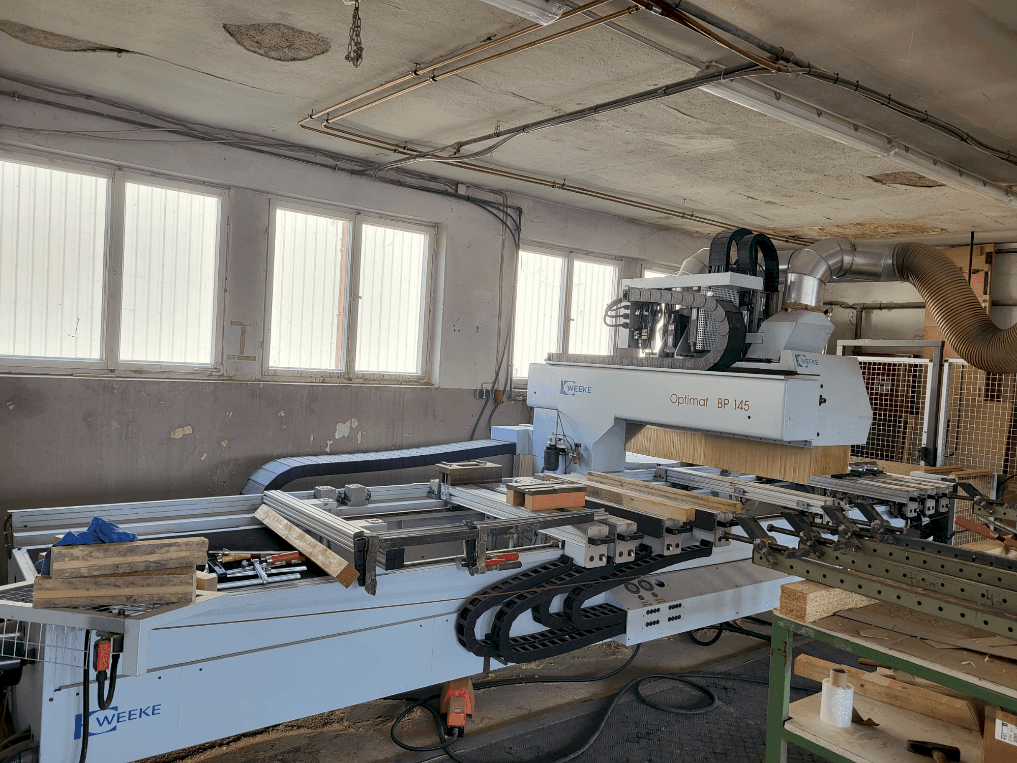 Mašīnas Weeke Optimat BP145 pretskats