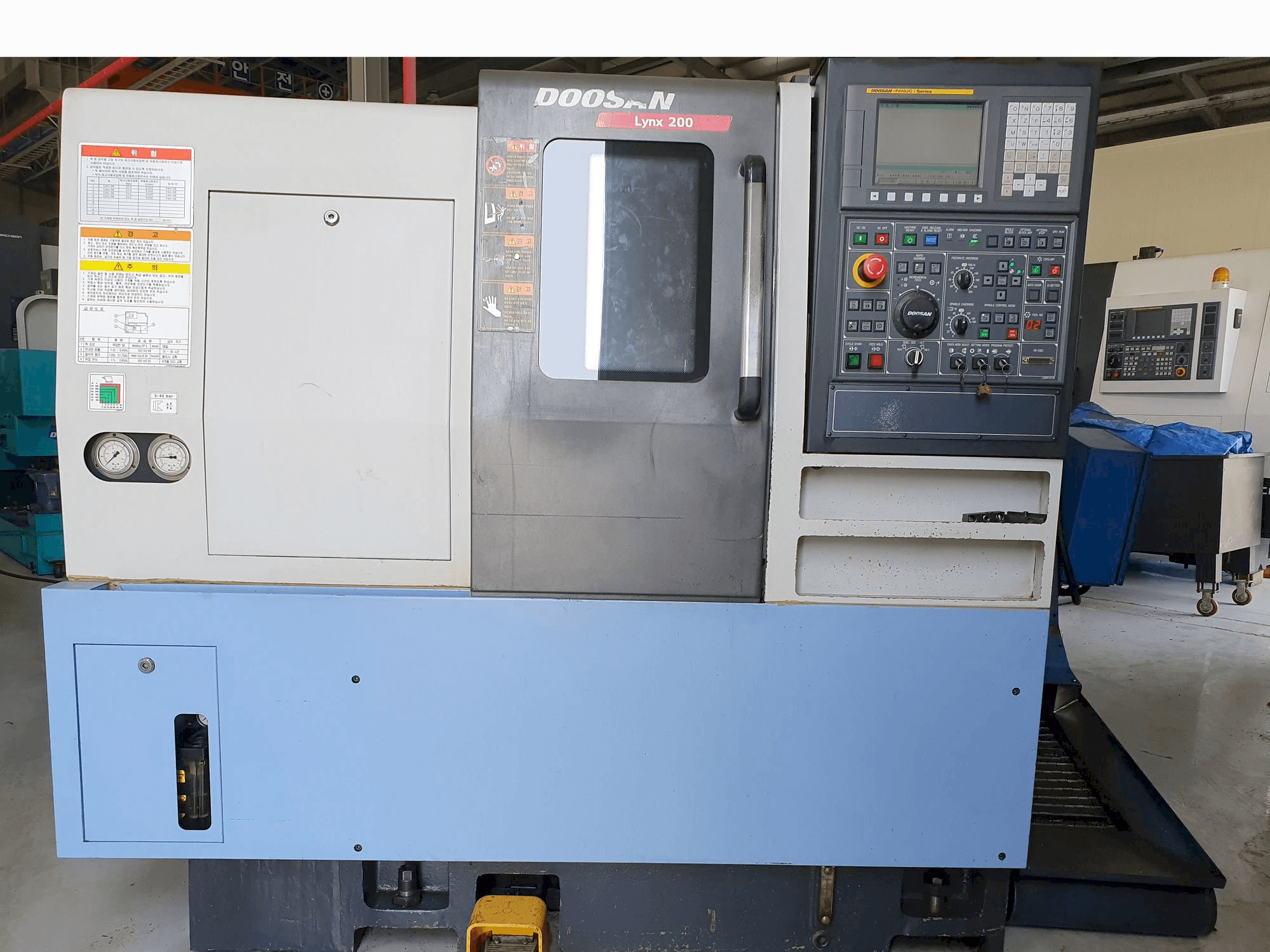 Mašīnas Doosan LYNX 200 A pretskats