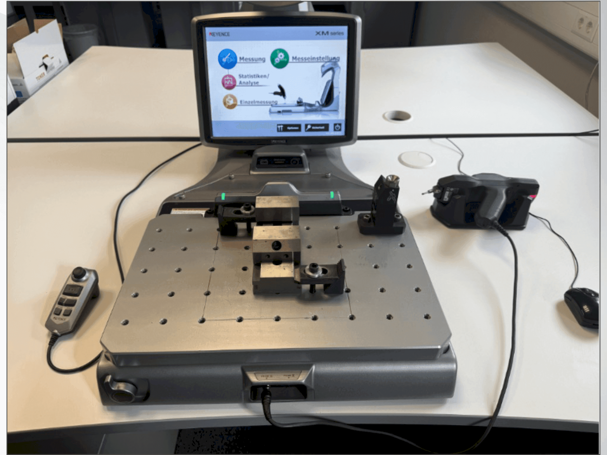 Mašīnas KEYENCE XM-1200 pretskats